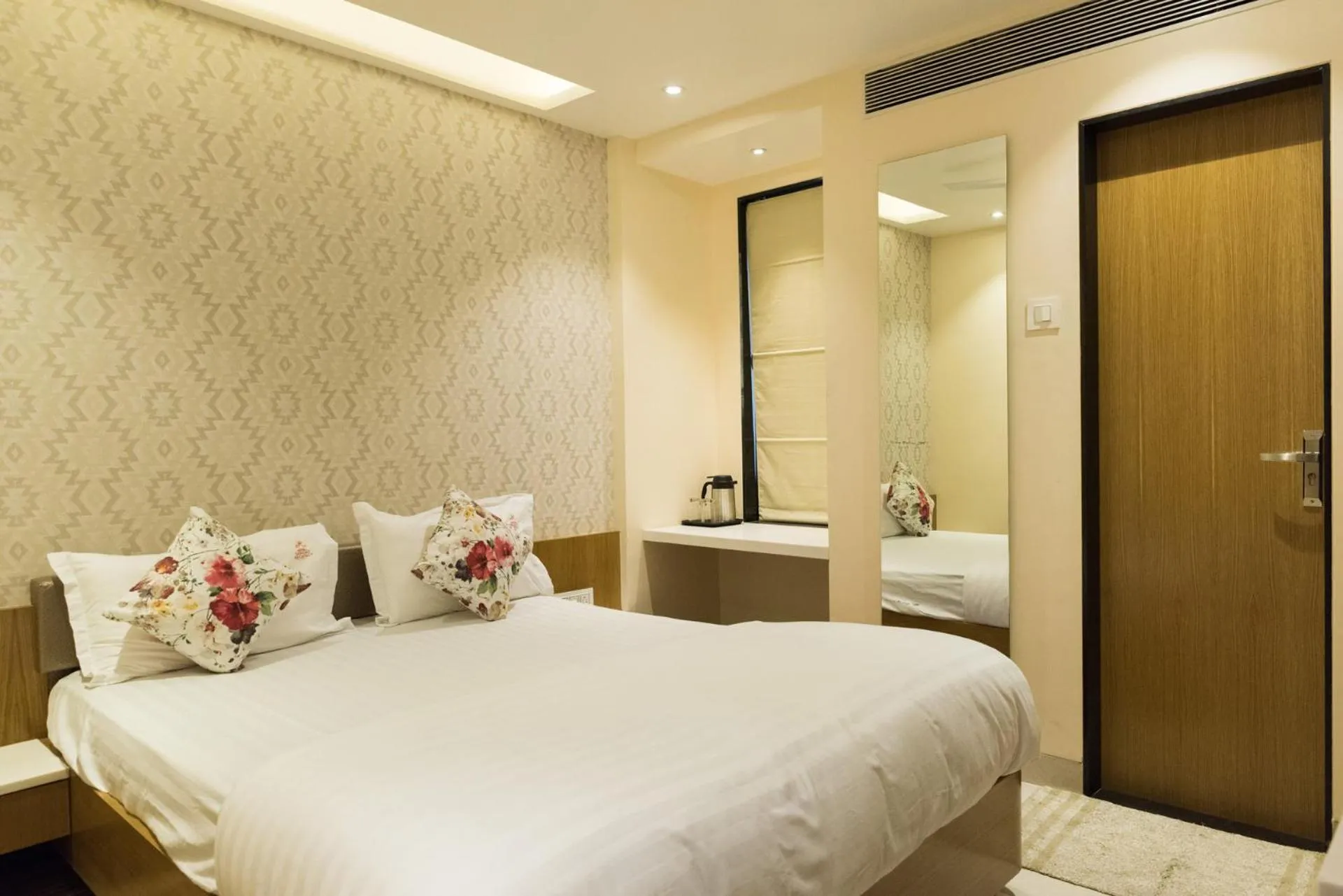 Bed in Hotel Sangat Regency