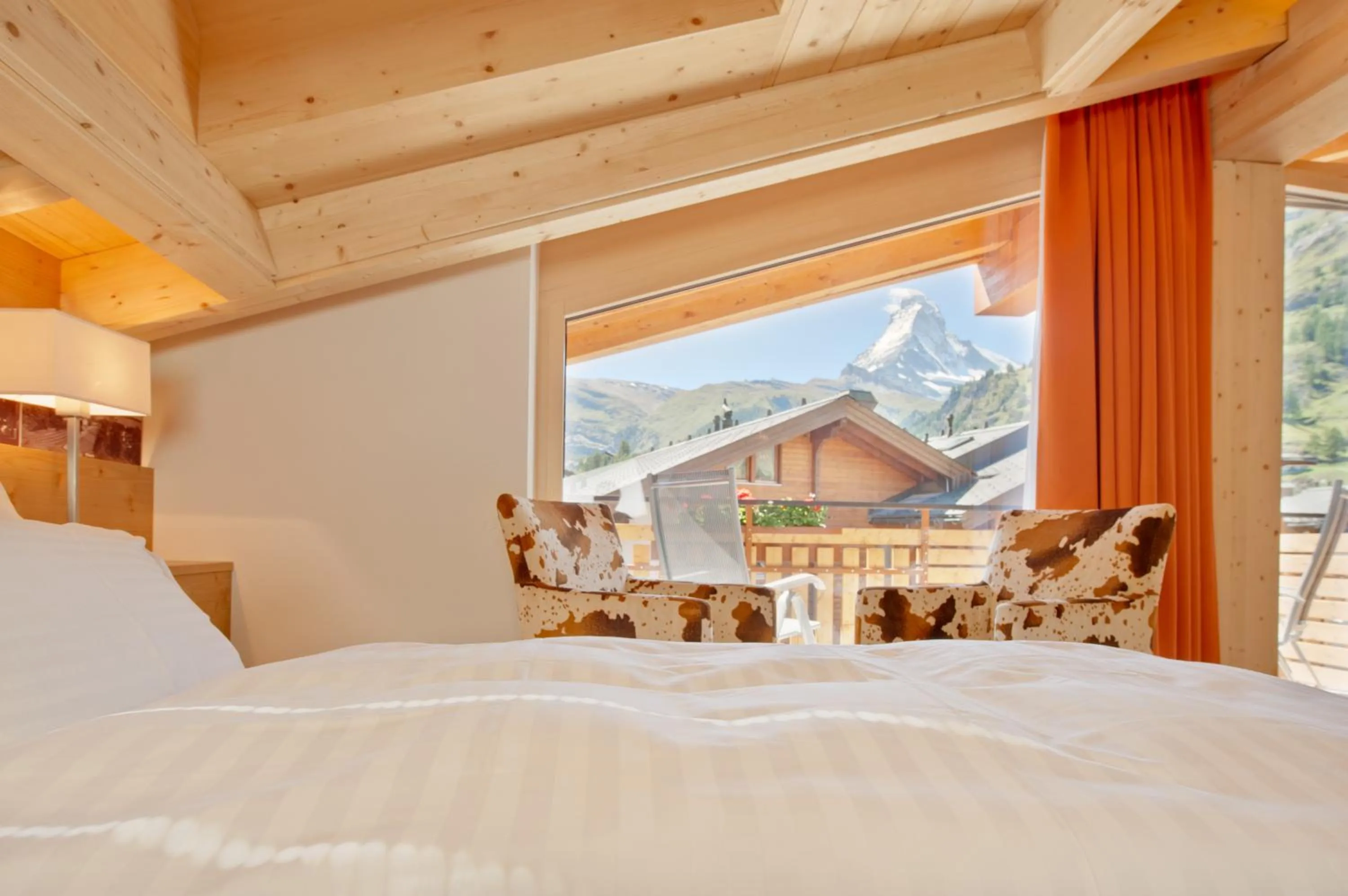 Bed in Hotel Aristella Swissflair