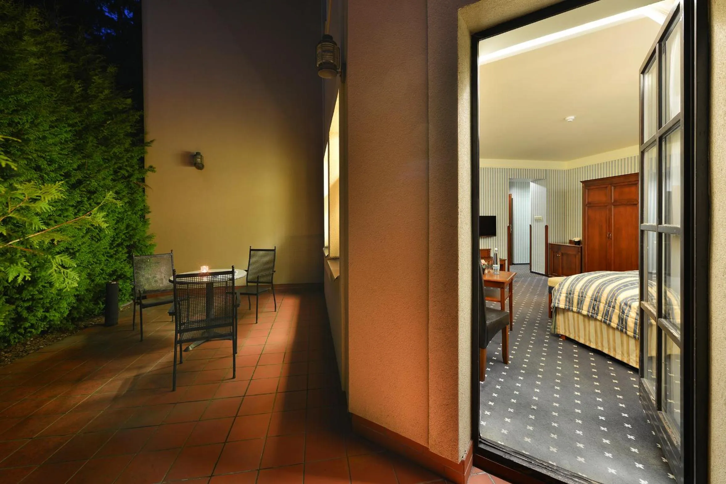 Patio, Bed in Wellness Golf Hotel Morris