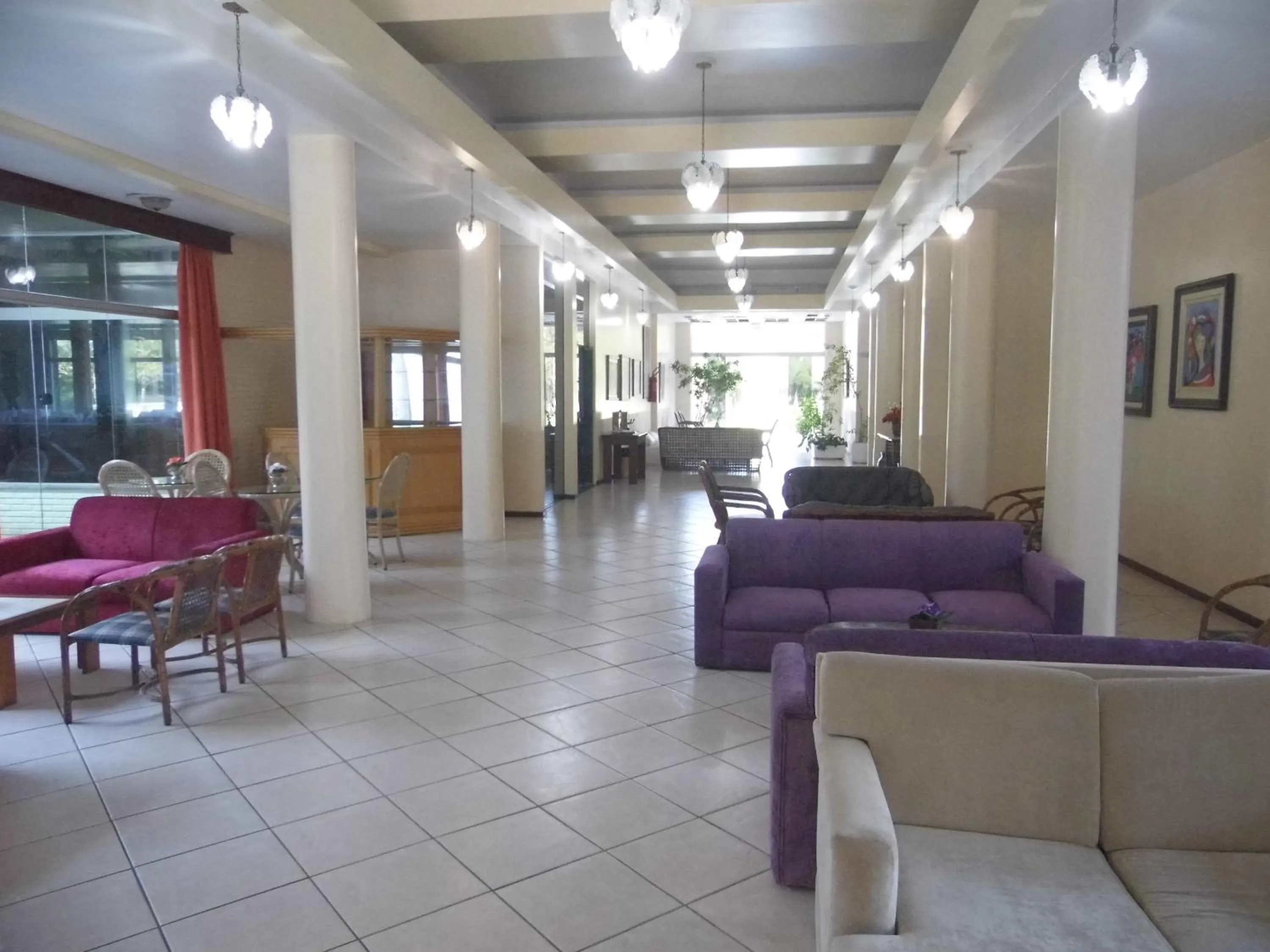 Communal lounge/ TV room in Ravena Cassino Hotel