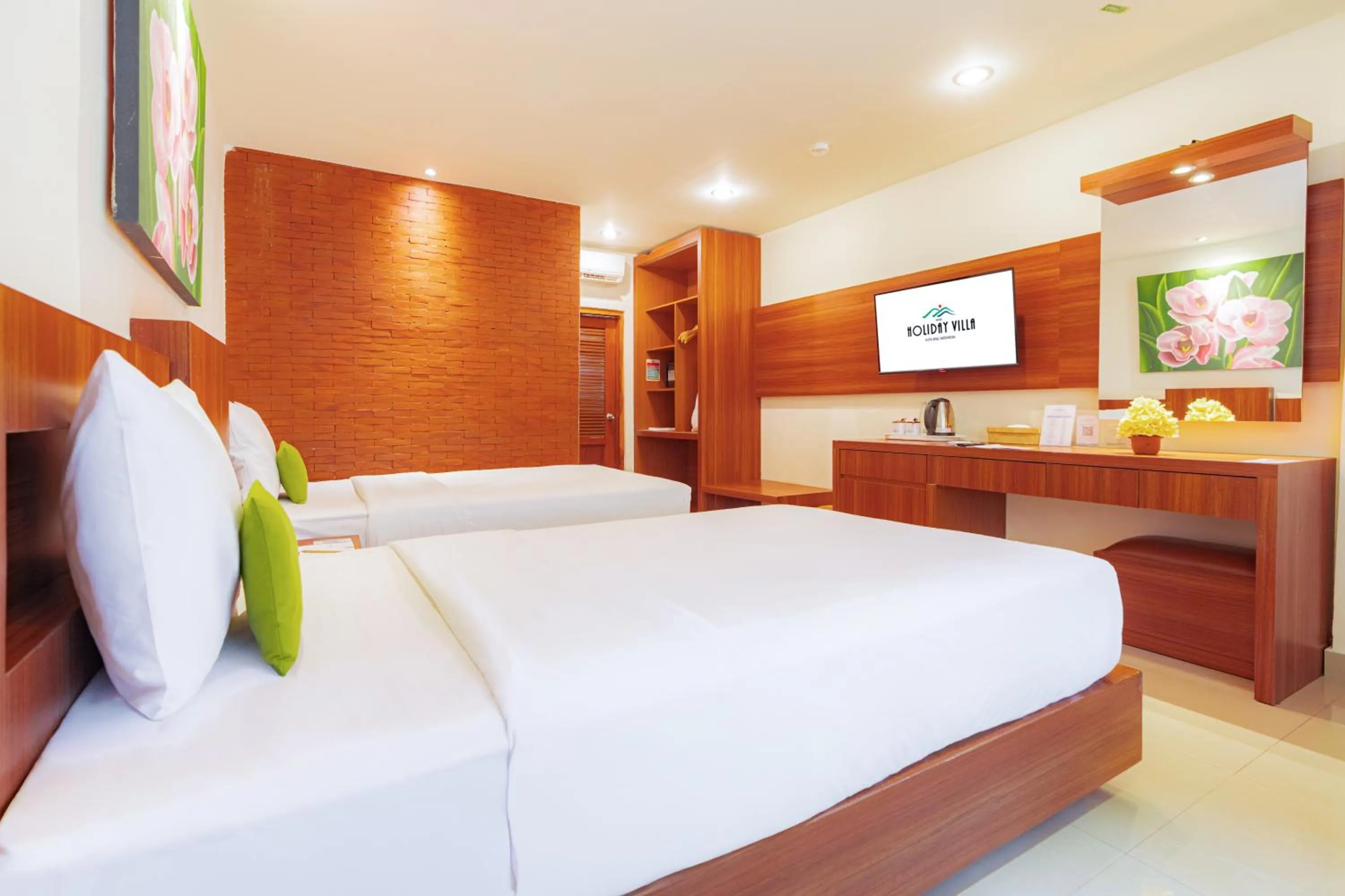 Bed in Wina Holiday Villa Kuta Bali