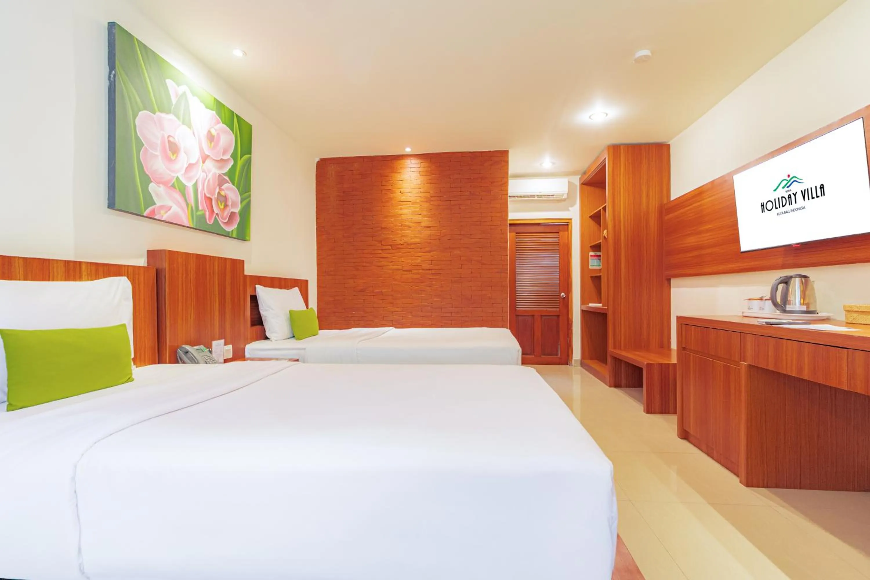 Bed in Wina Holiday Villa Kuta Bali