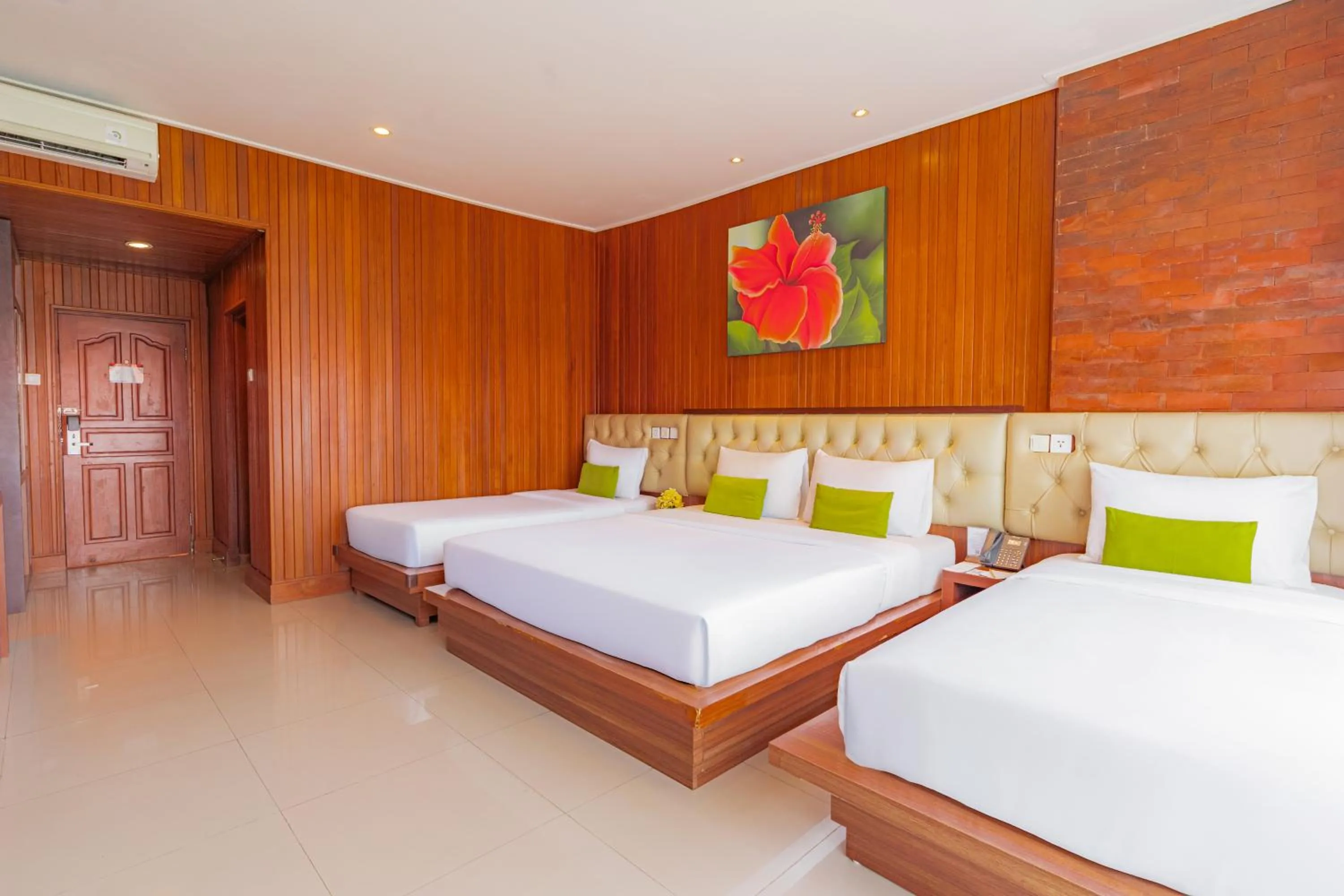Bed in Wina Holiday Villa Kuta Bali