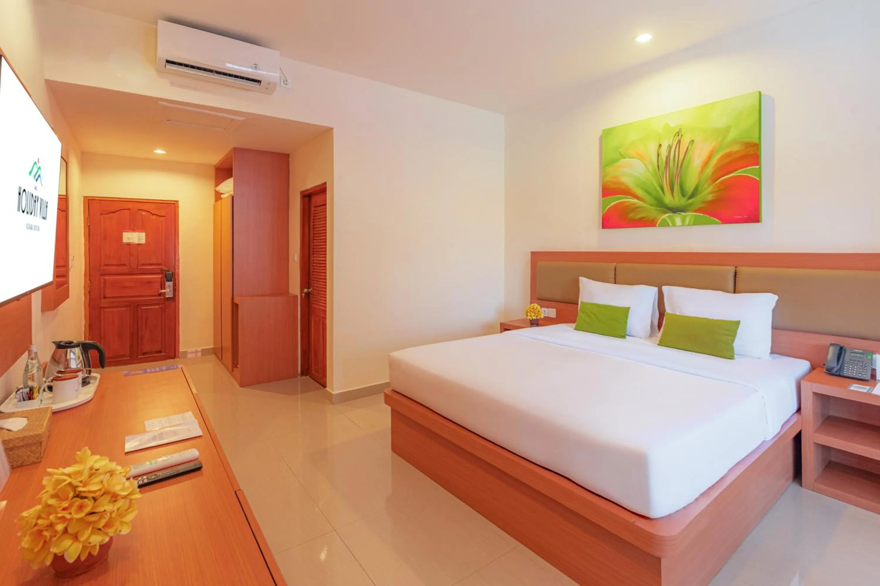 Bed in Wina Holiday Villa Kuta Bali
