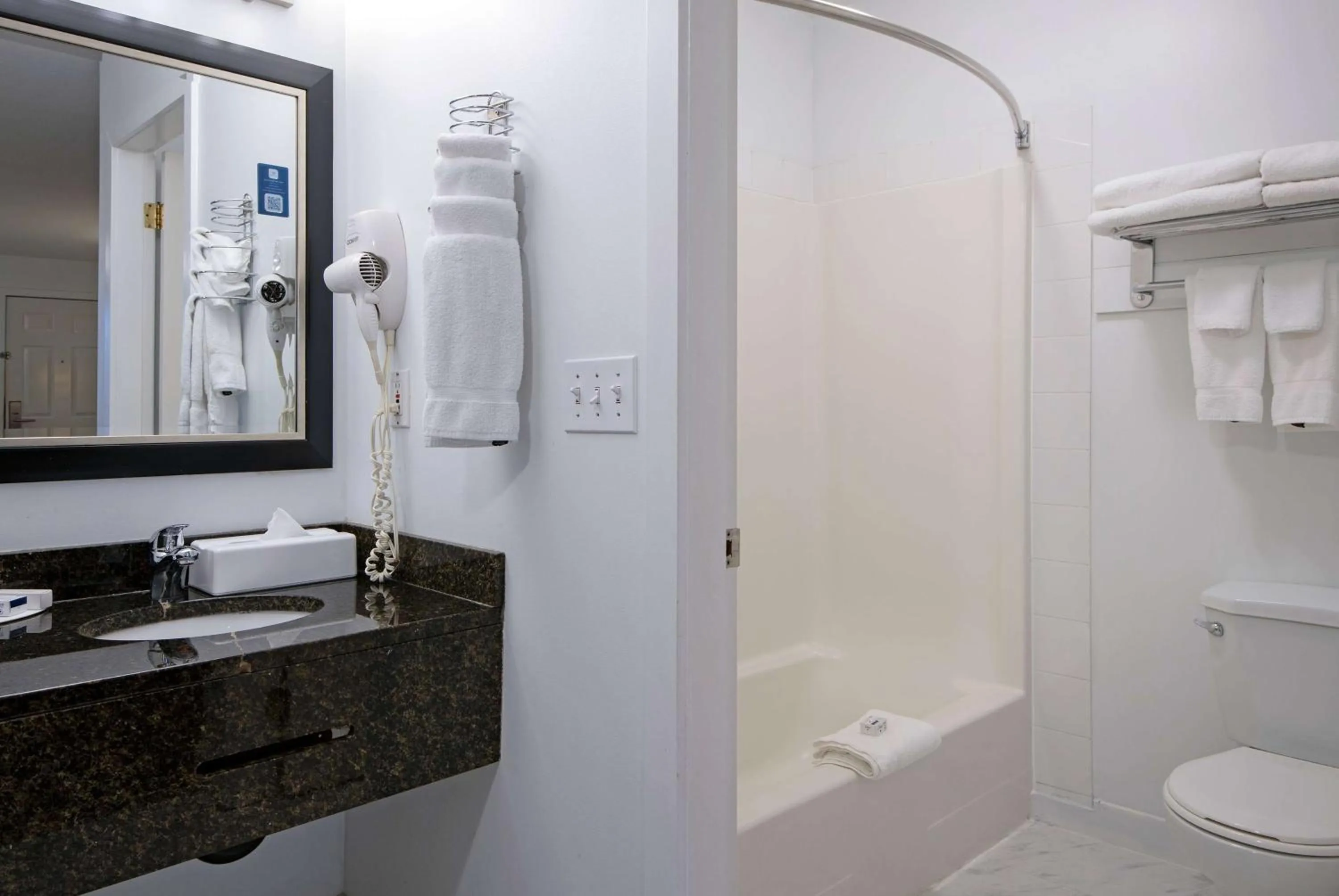 Bathroom in Travelodge by Wyndham Kamloops Mountview