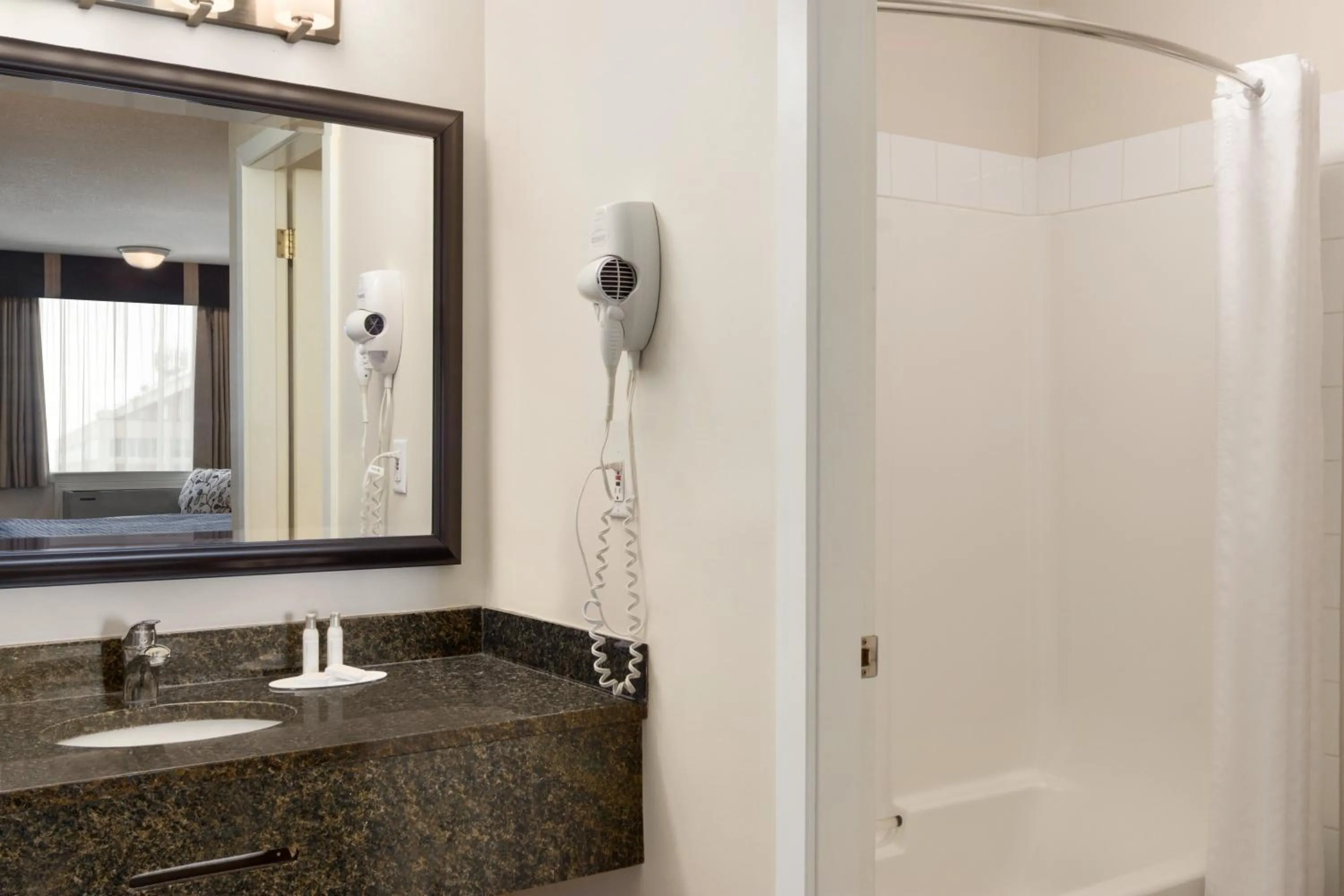 Bathroom in Travelodge by Wyndham Kamloops Mountview