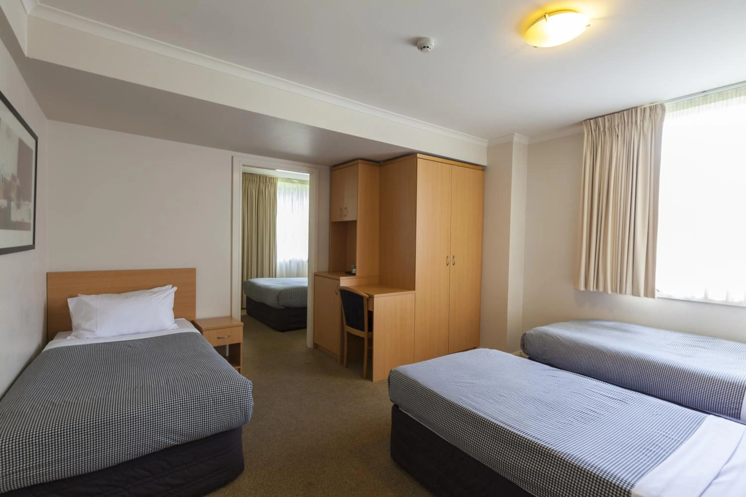 Bed in The Denman Hotel in Thredbo