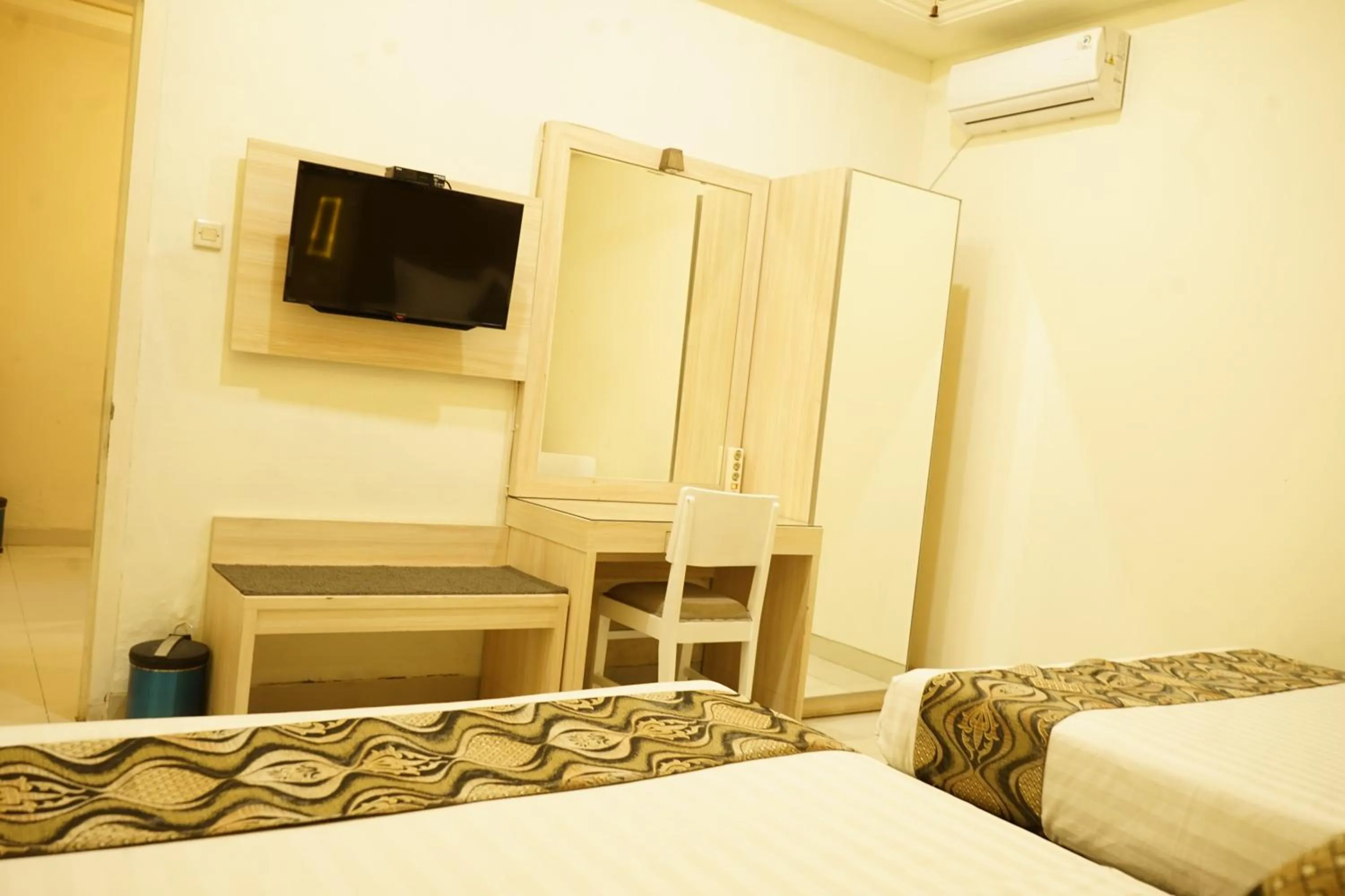 Bed in Hotel Indah Palace Tawangmangu