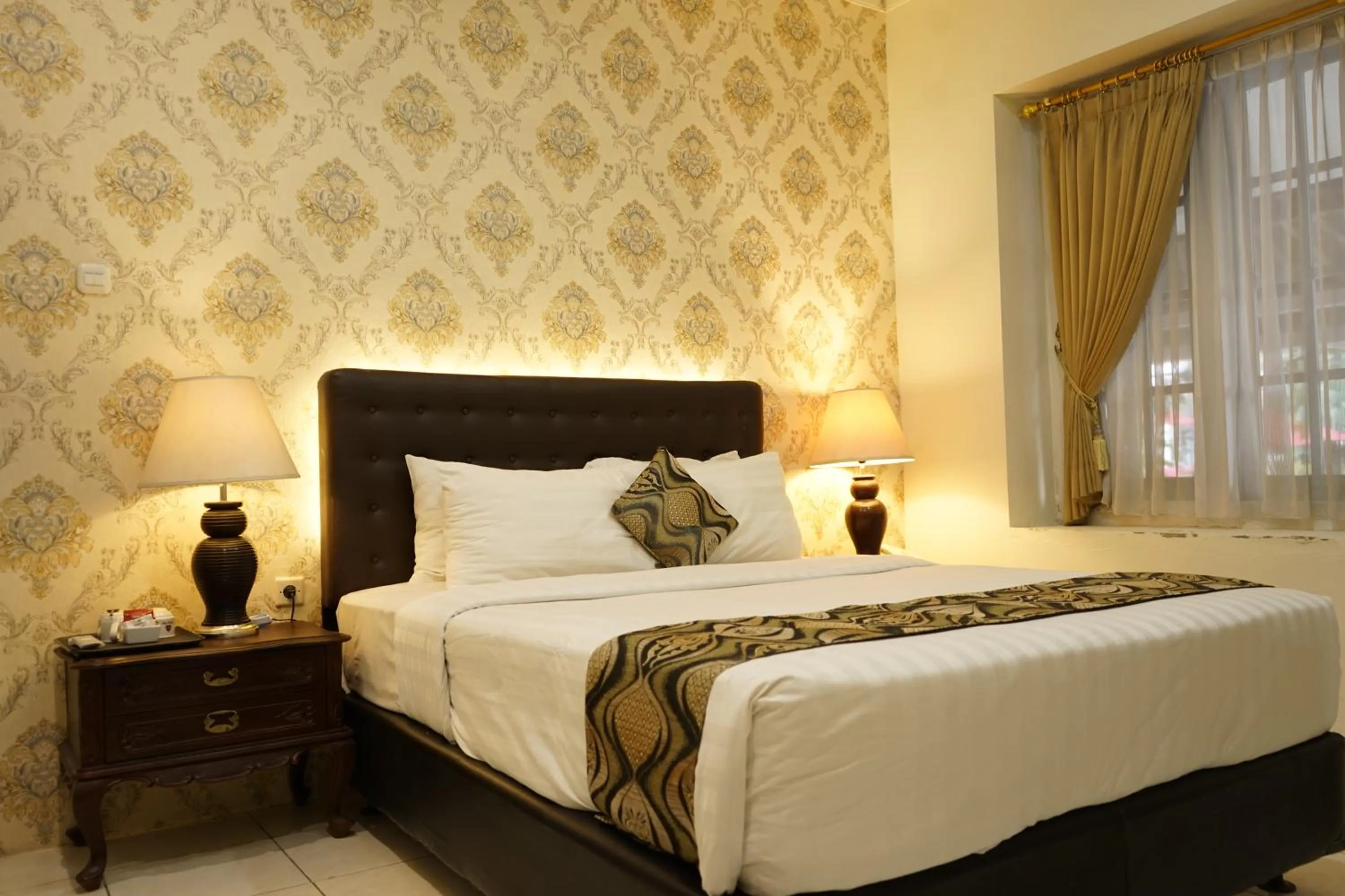 Bed in Hotel Indah Palace Tawangmangu