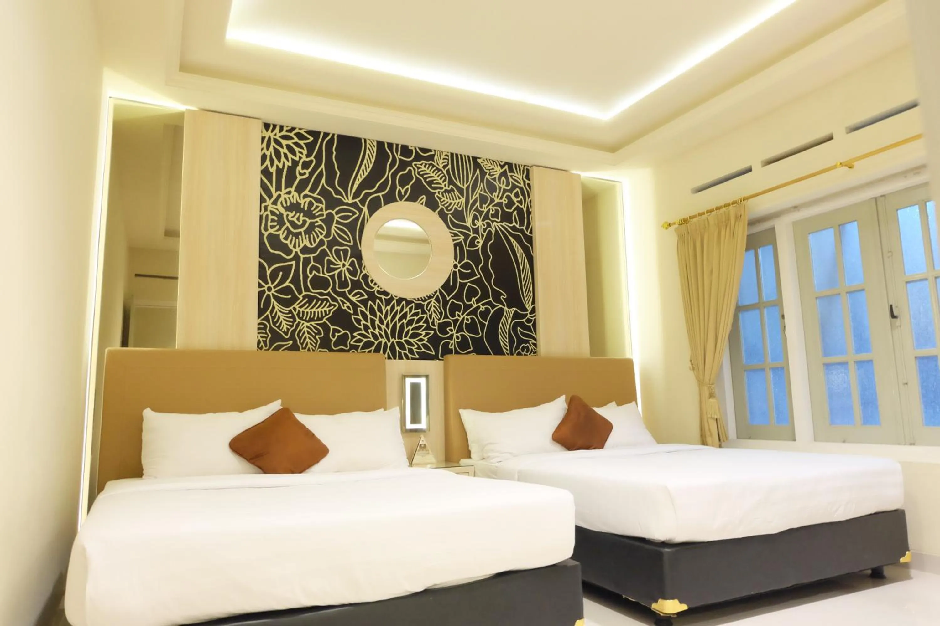 Bed in Hotel Indah Palace Tawangmangu