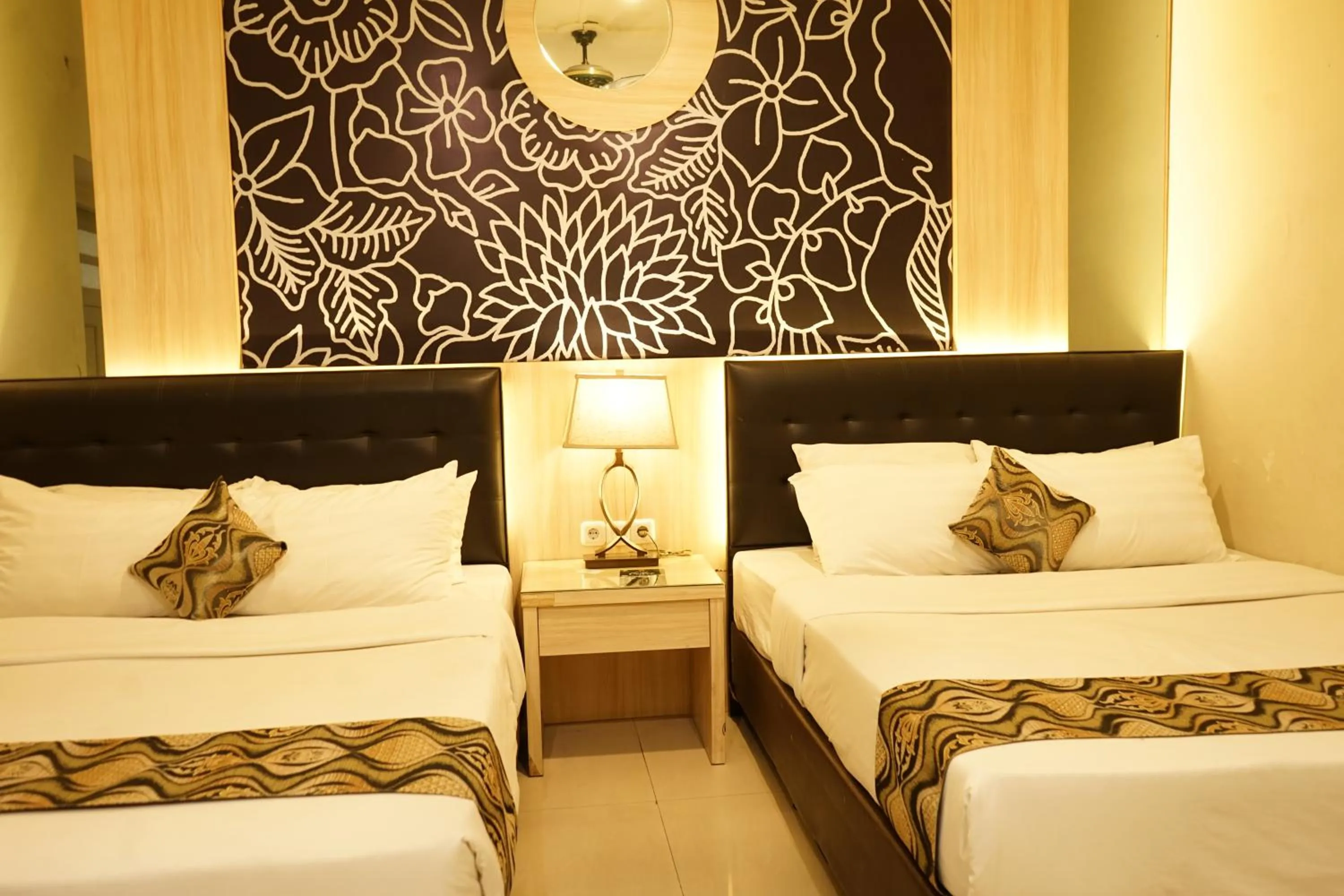 Bed in Hotel Indah Palace Tawangmangu