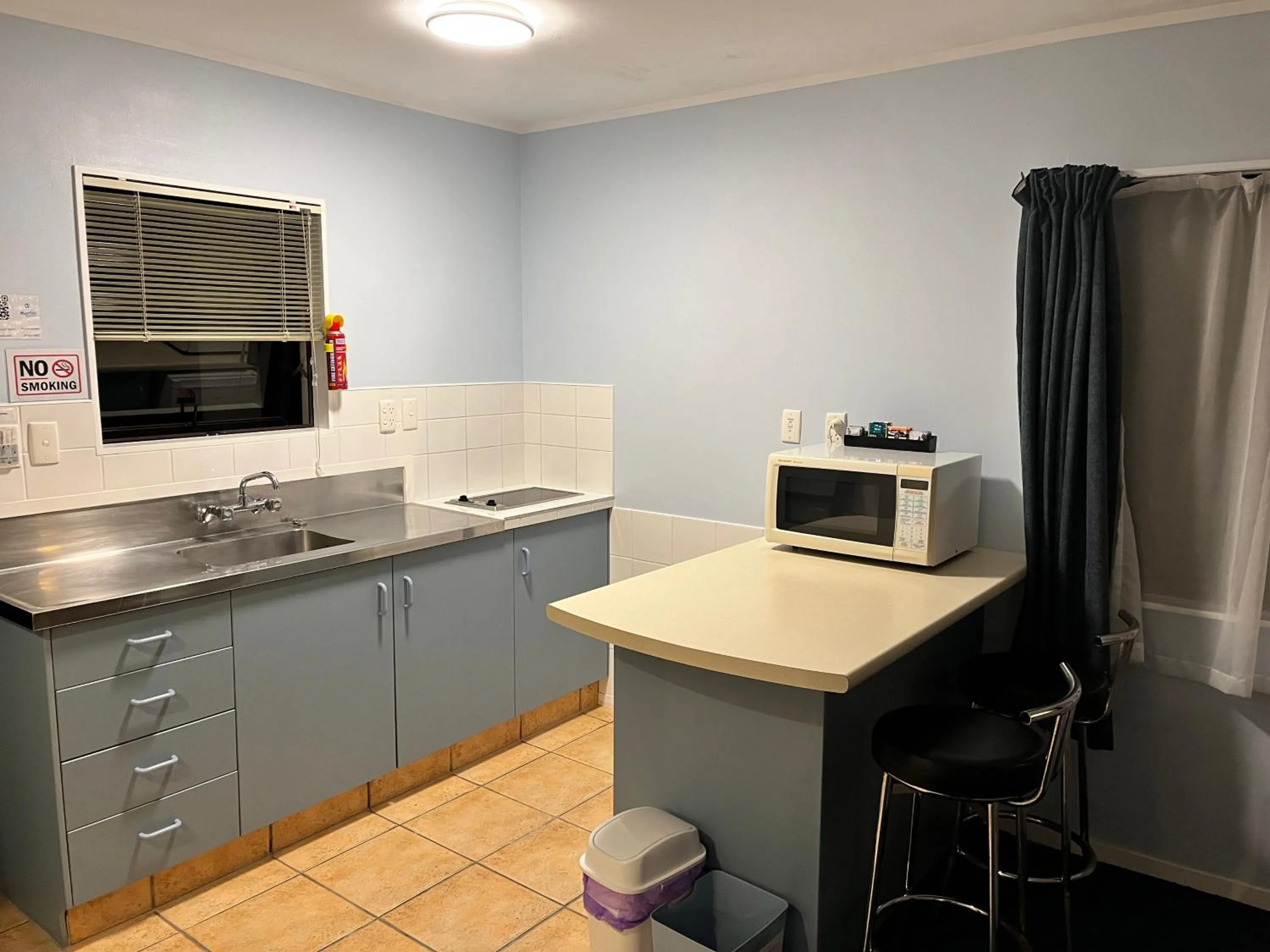 Kitchen or kitchenette in Marlin Court Motel