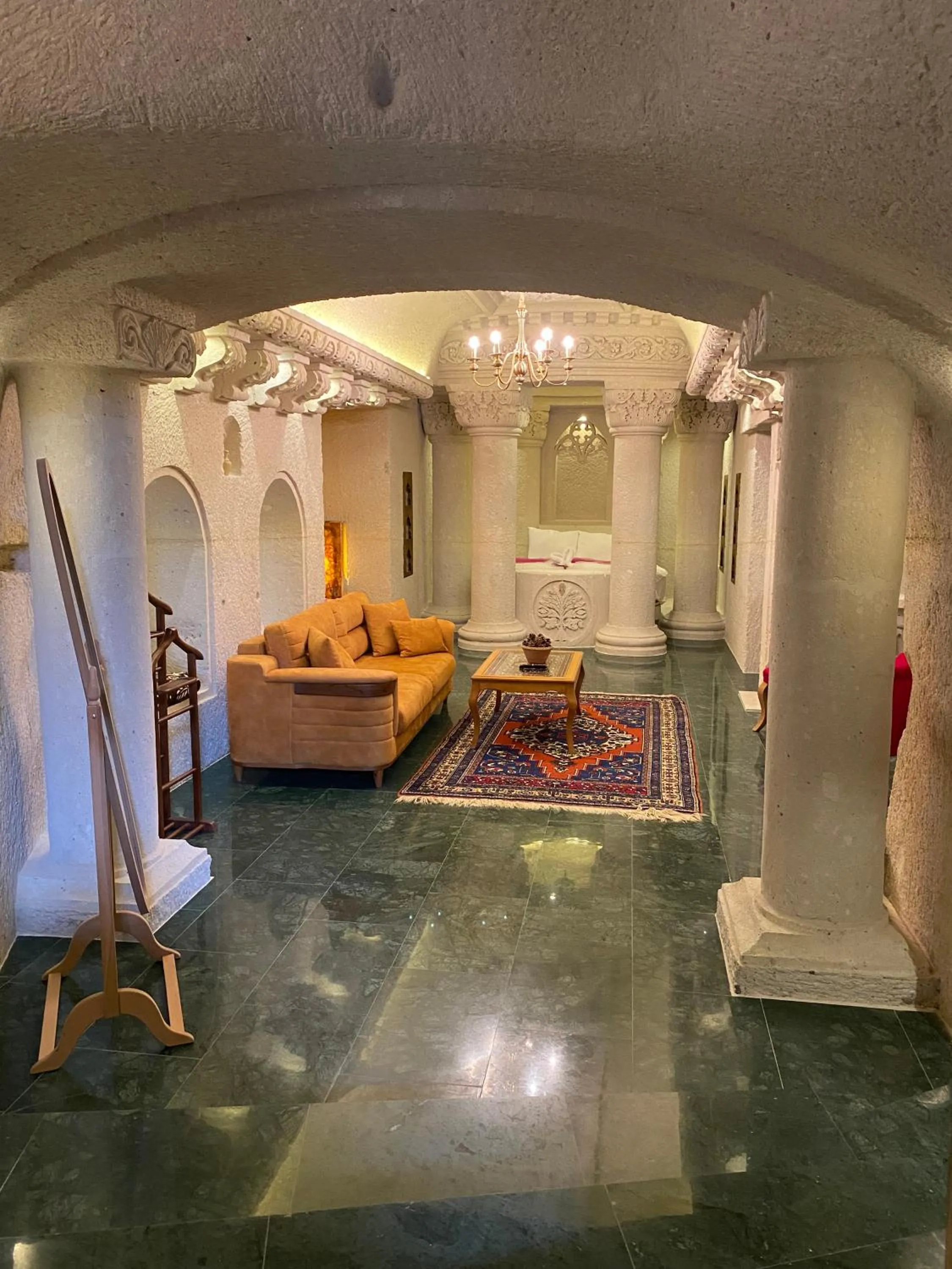 Bed in Abu Hayat Cave Suites