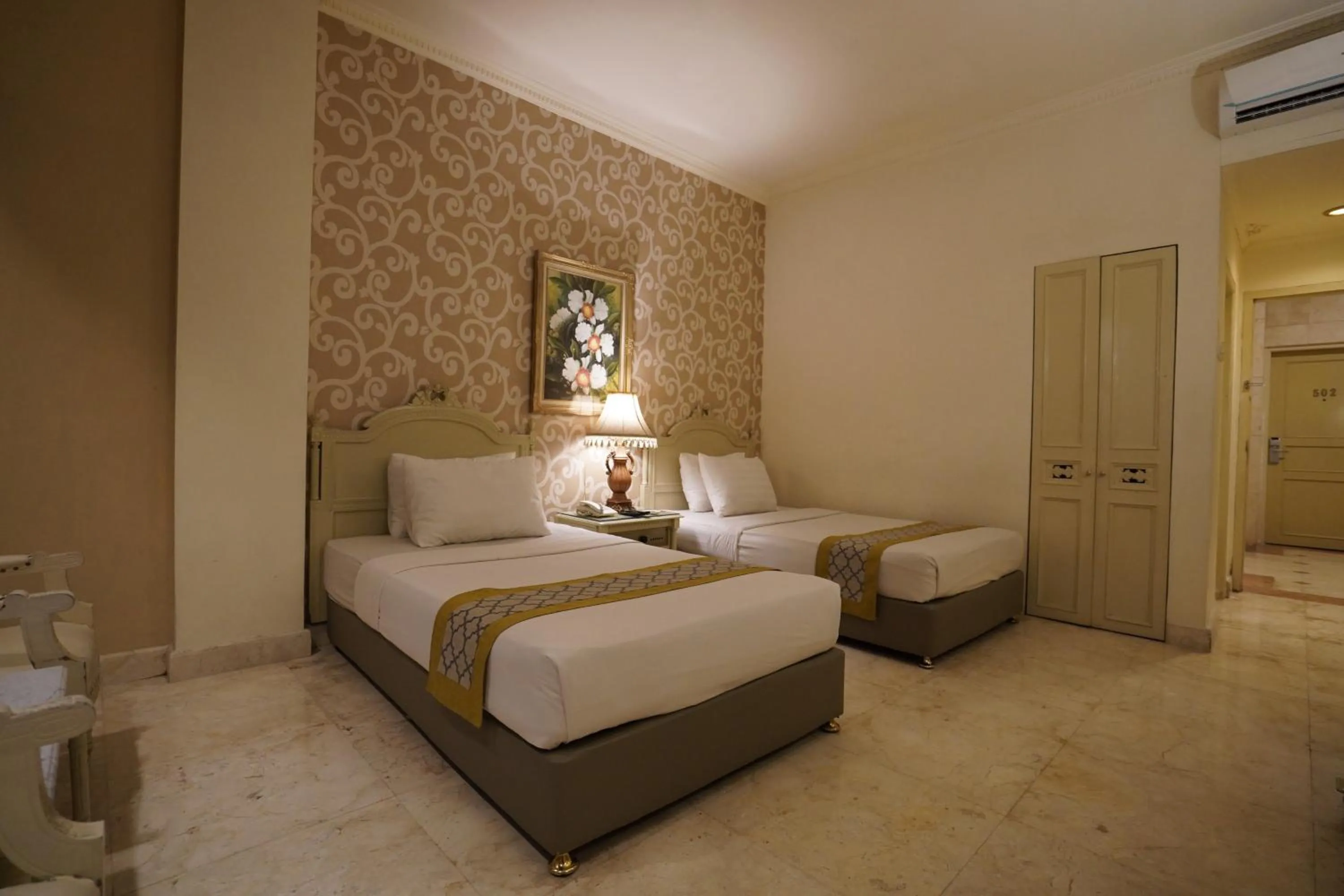 Bed in Hotel Indah Palace Solo