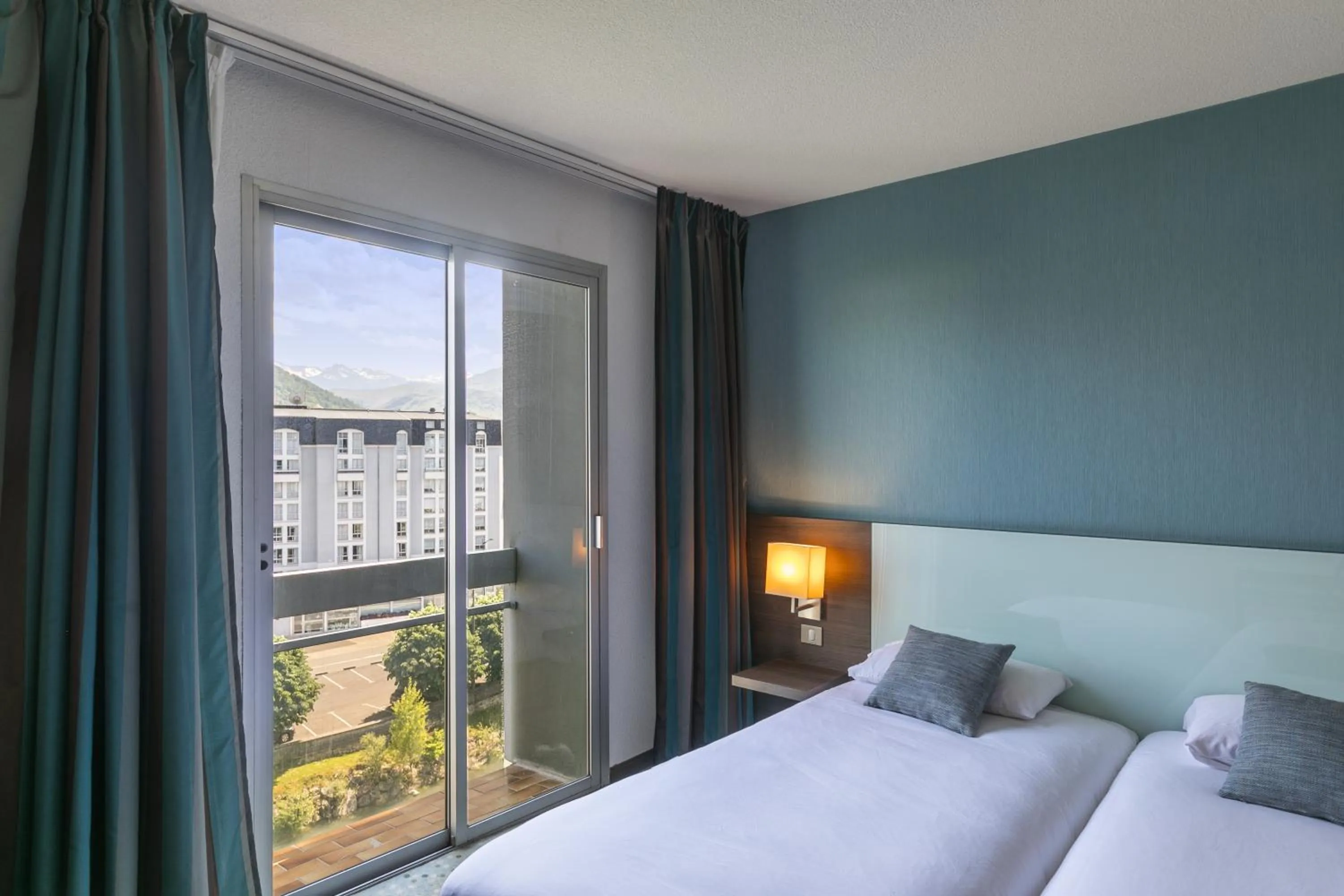 Photo of the whole room, Bed in Hôtel Miramont