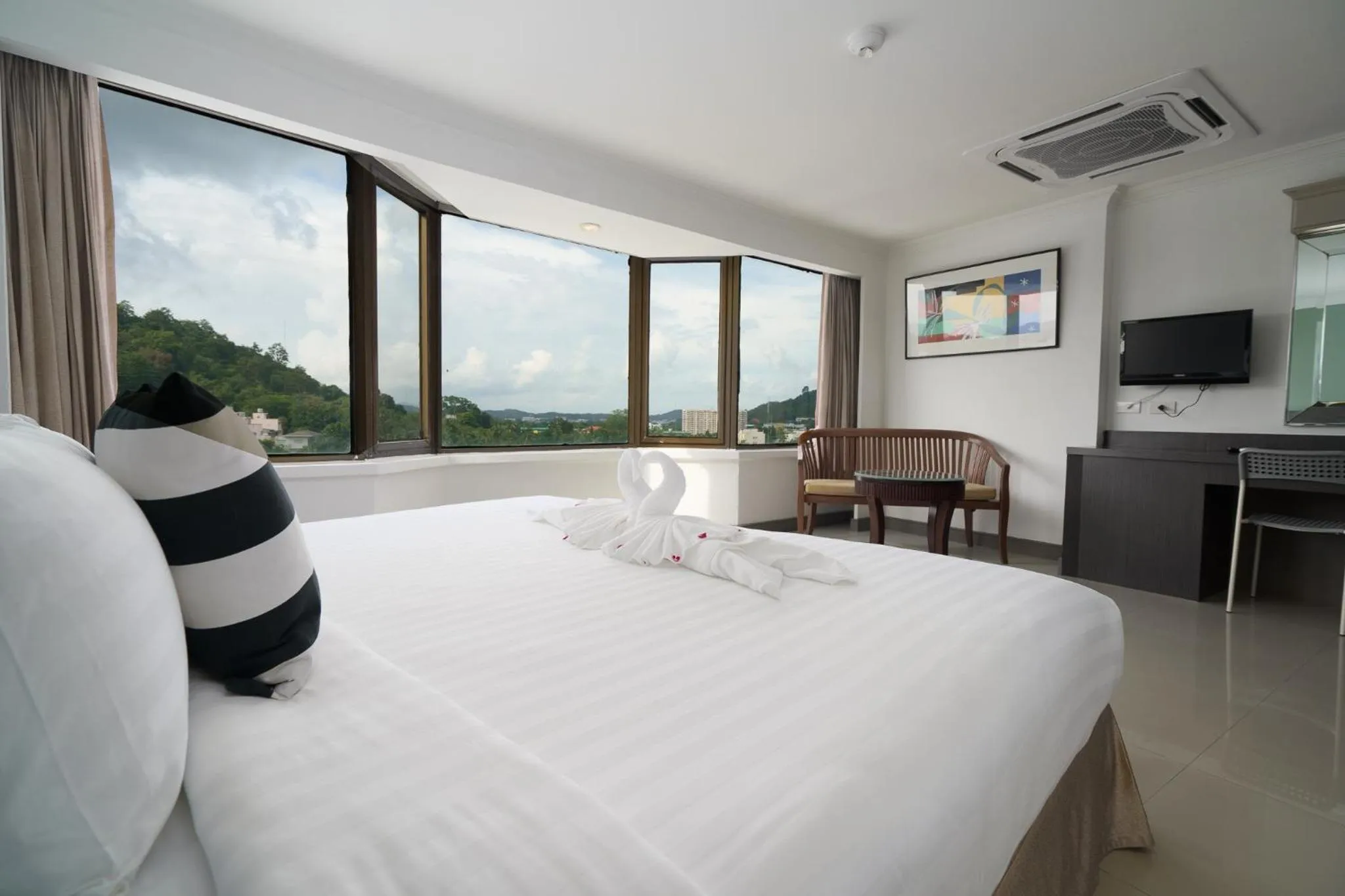 Bed in I Pavilion Hotel Phuket