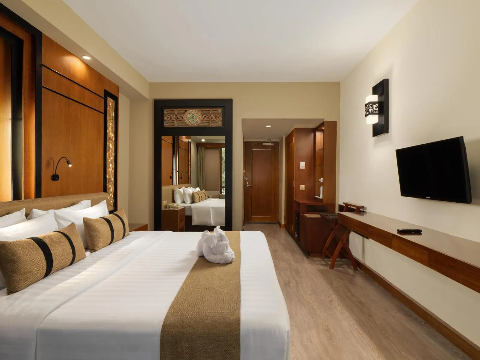 Bed in Nirwana Resort Hotel