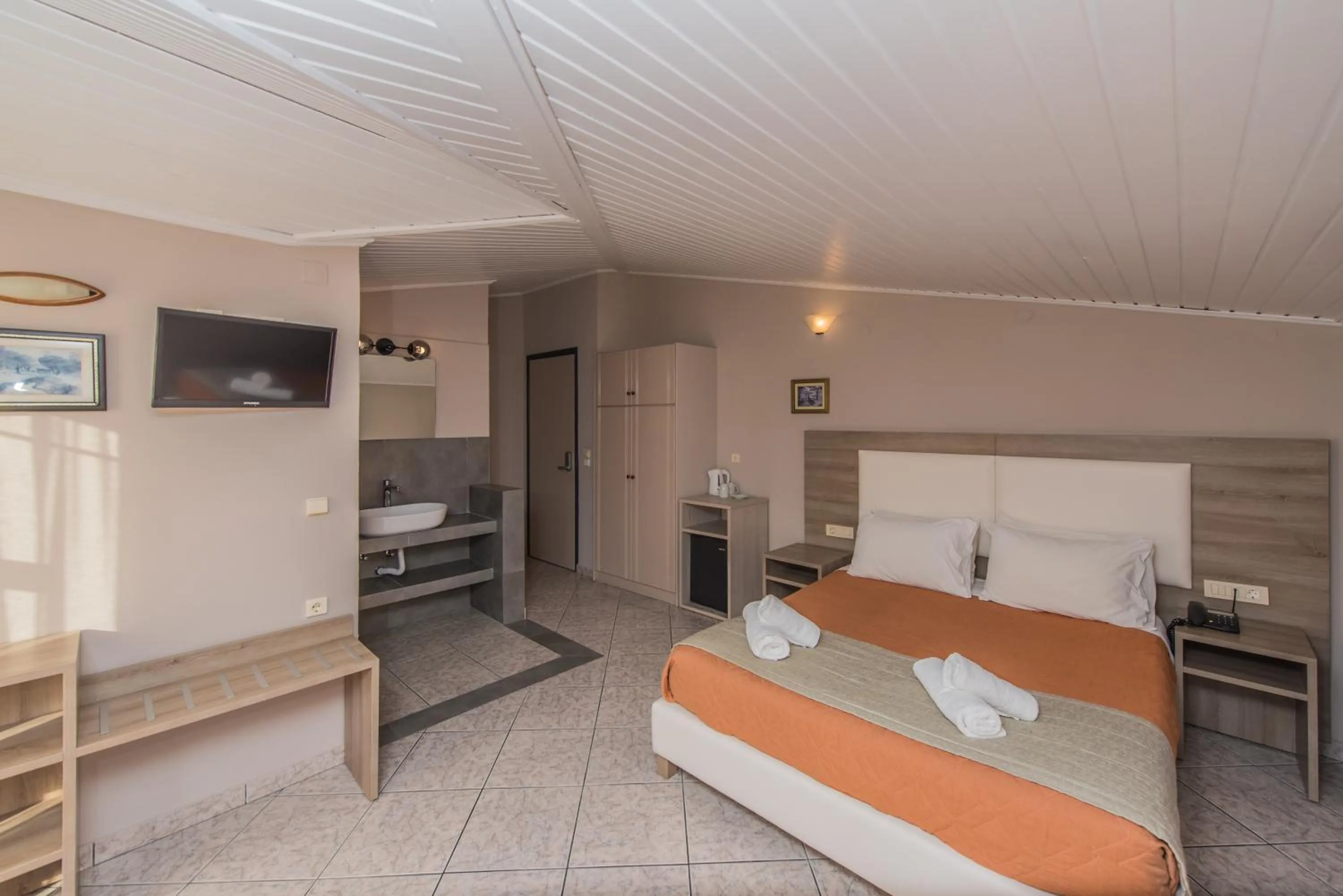 Bed in Planos Beach Hotel