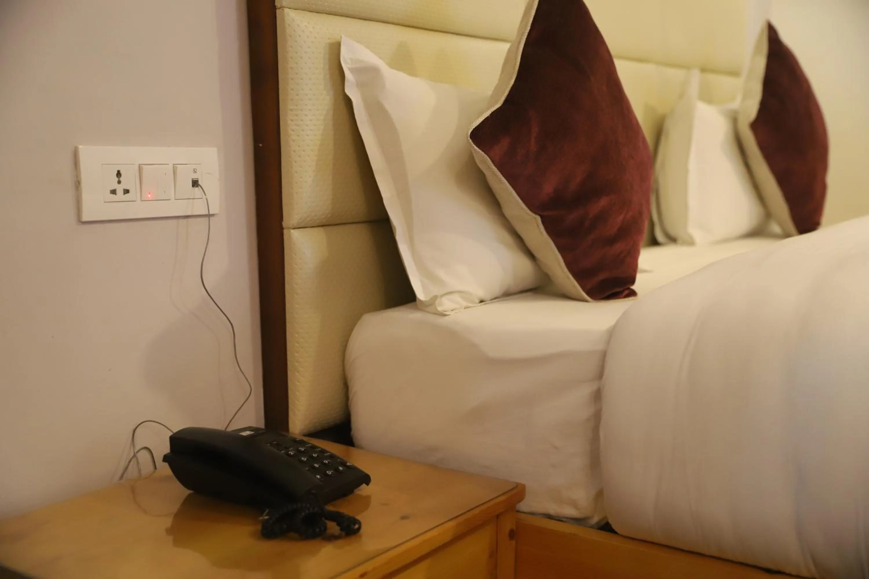 Bed in Nepal Cottage Resort