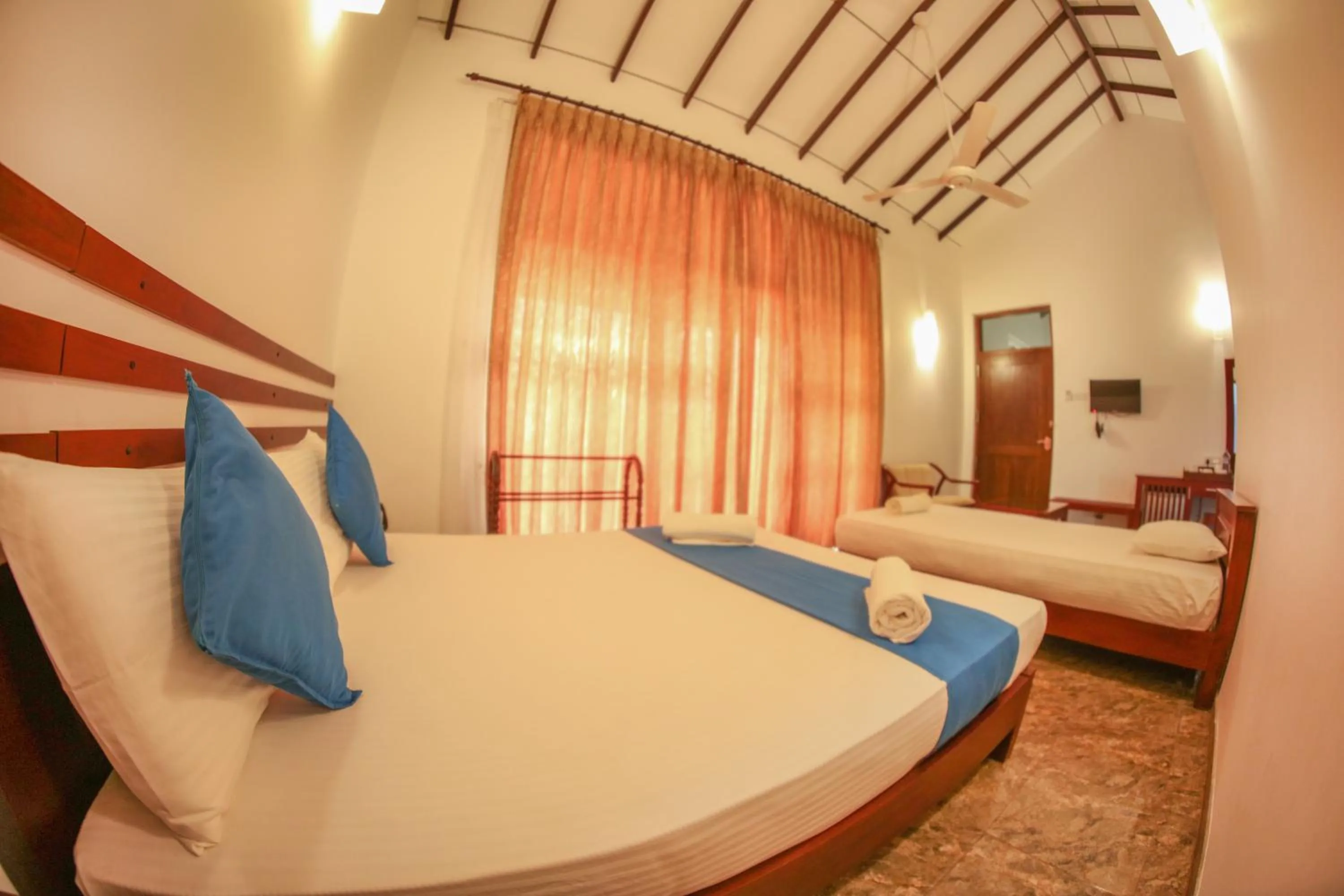 Bed in White Rose Beach Resort