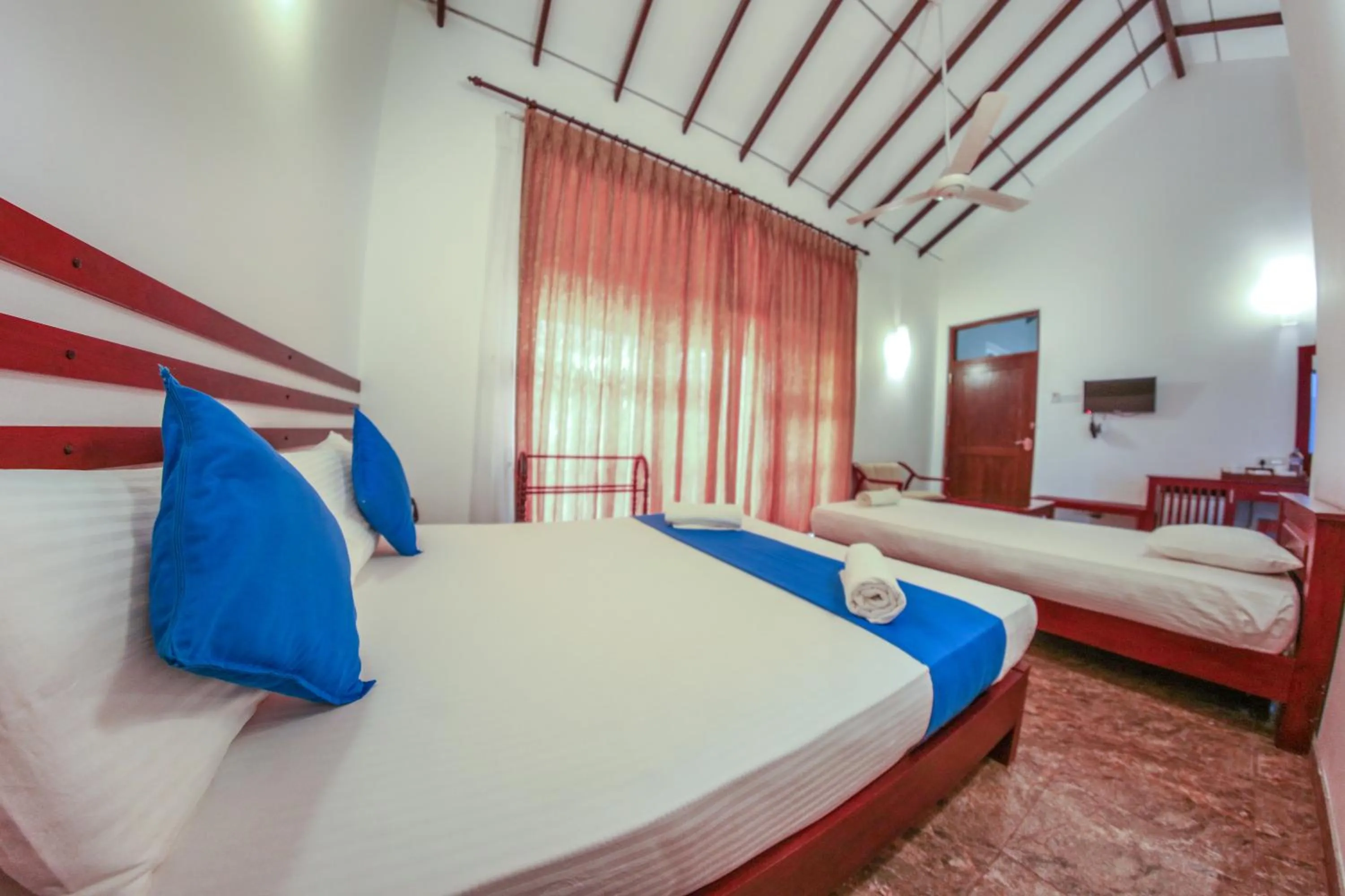 Bed in White Rose Beach Resort