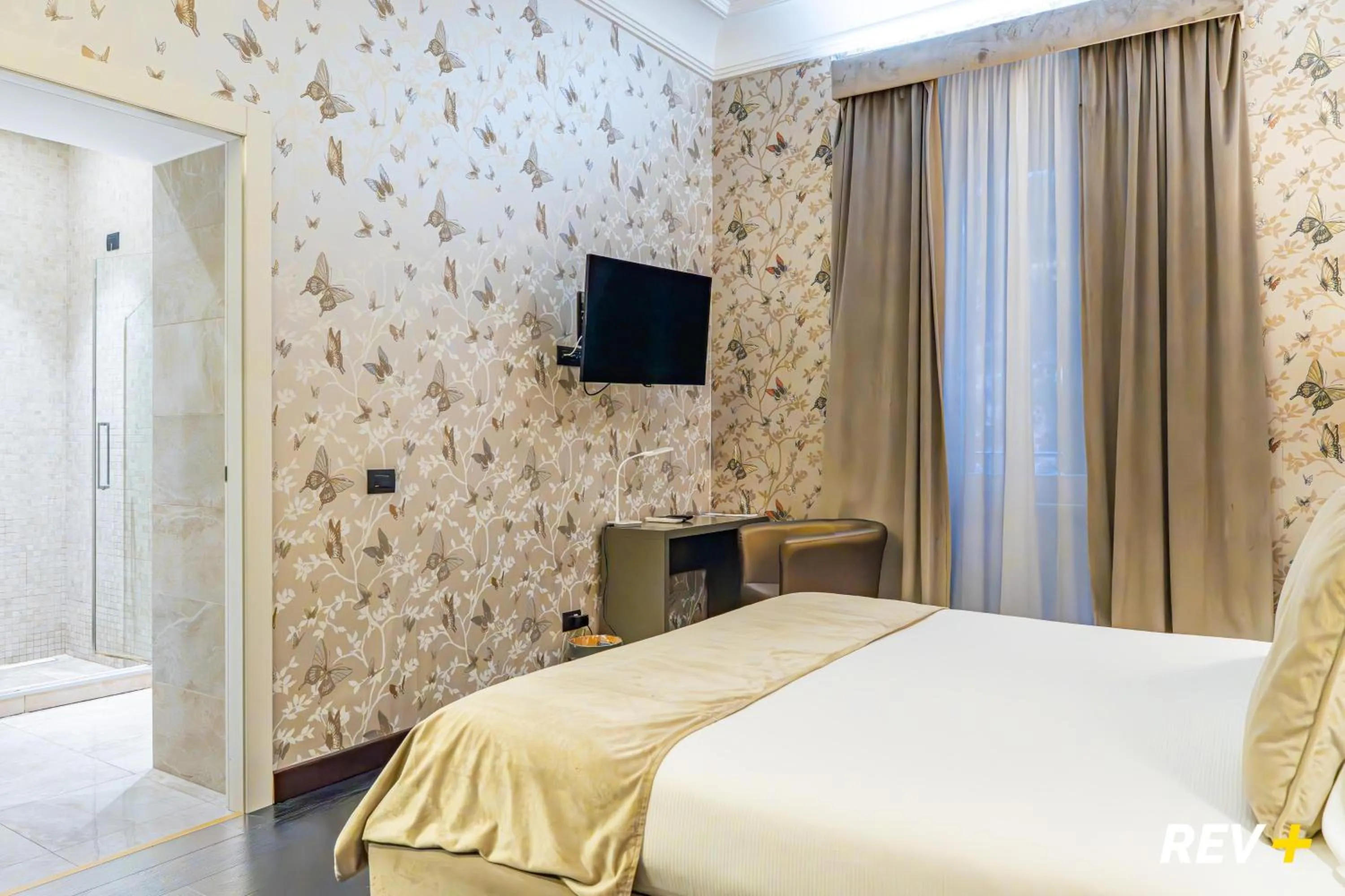 Photo of the whole room, Bed in Via Veneto Suites