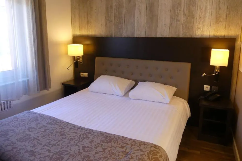 Bed in Hotel De Maaskant