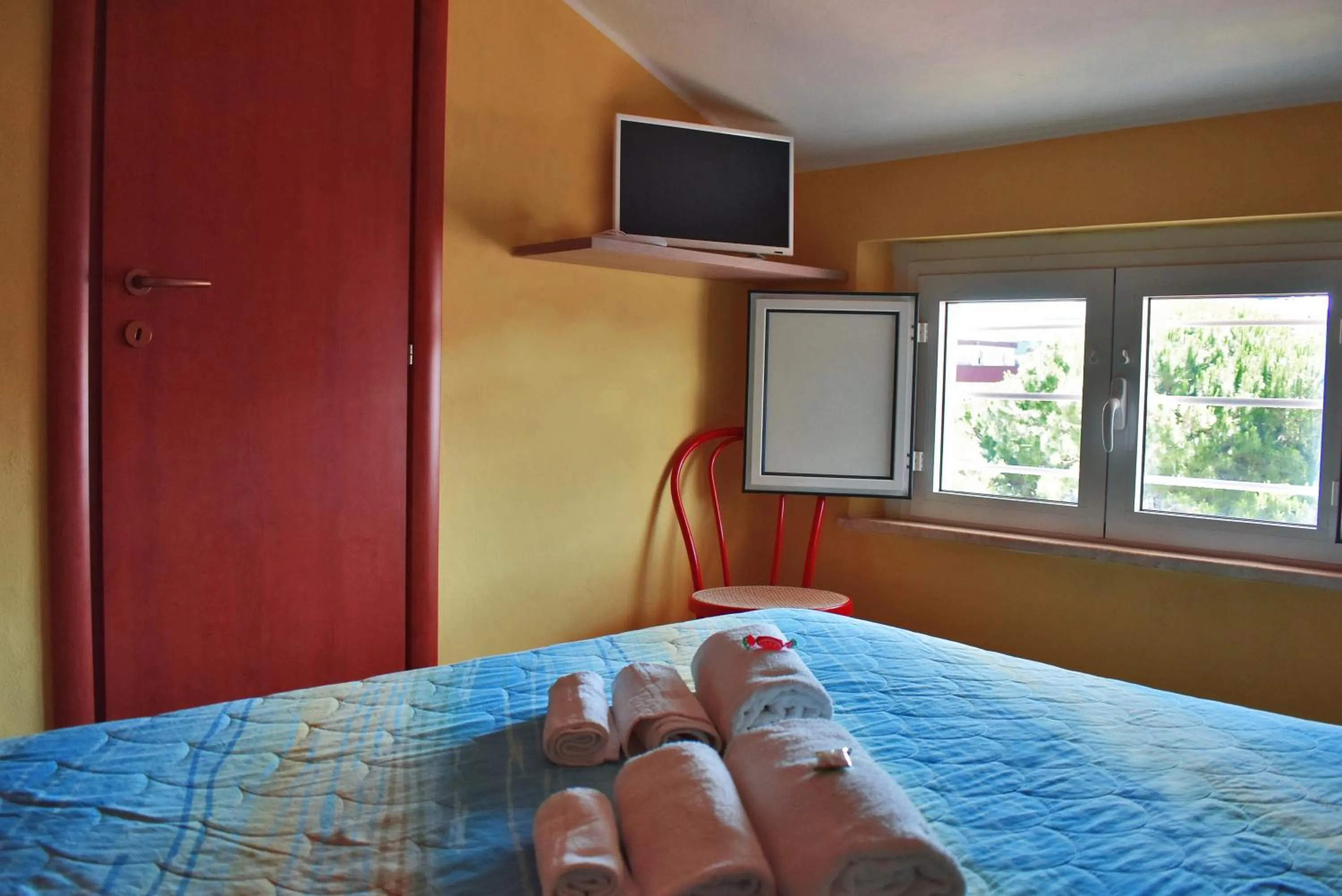 Bed in Hotel Urbinati