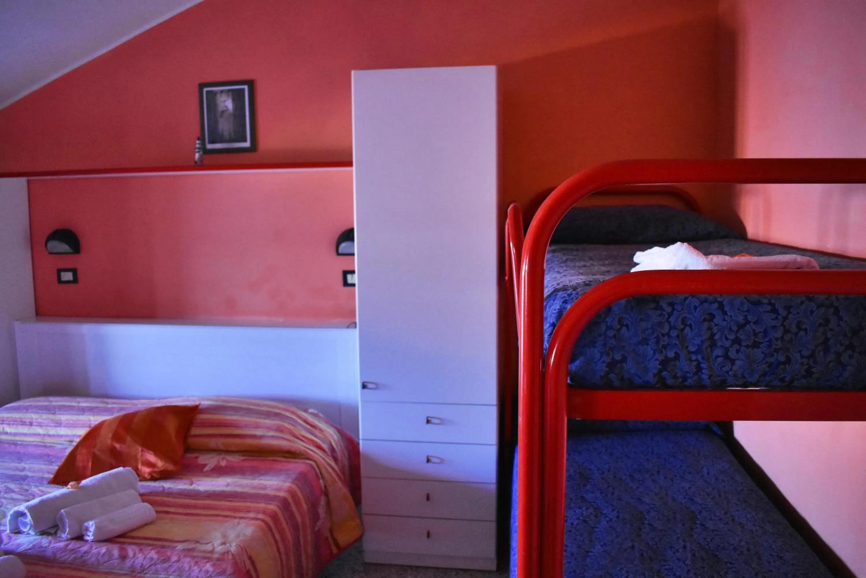 Bed in Hotel Urbinati