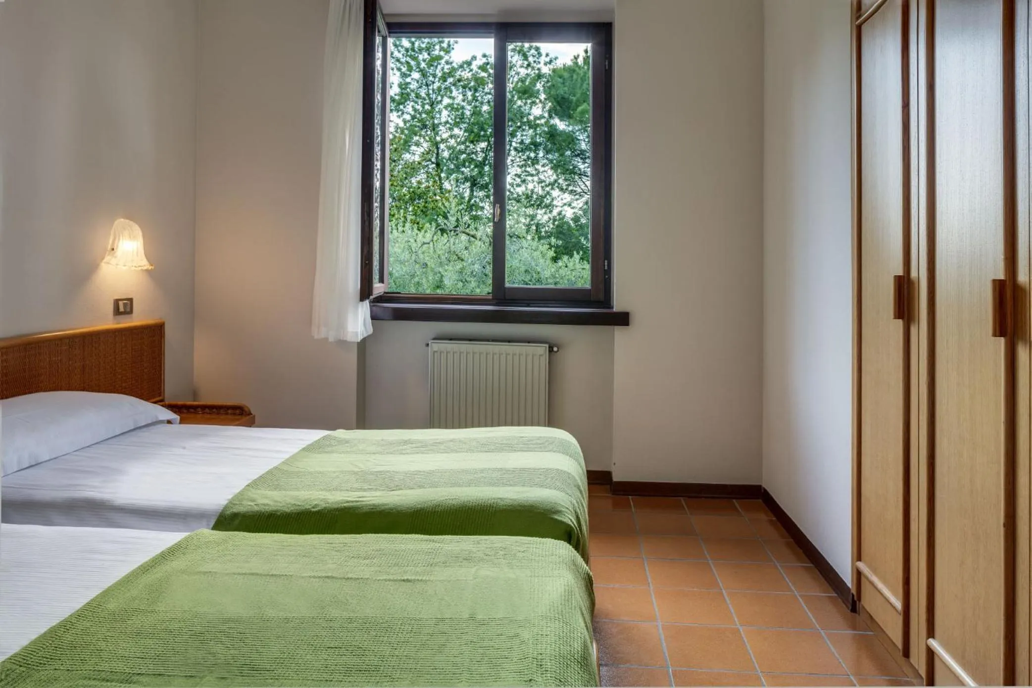 Bedroom, Bed in Poiano Garda Resort Appartamenti