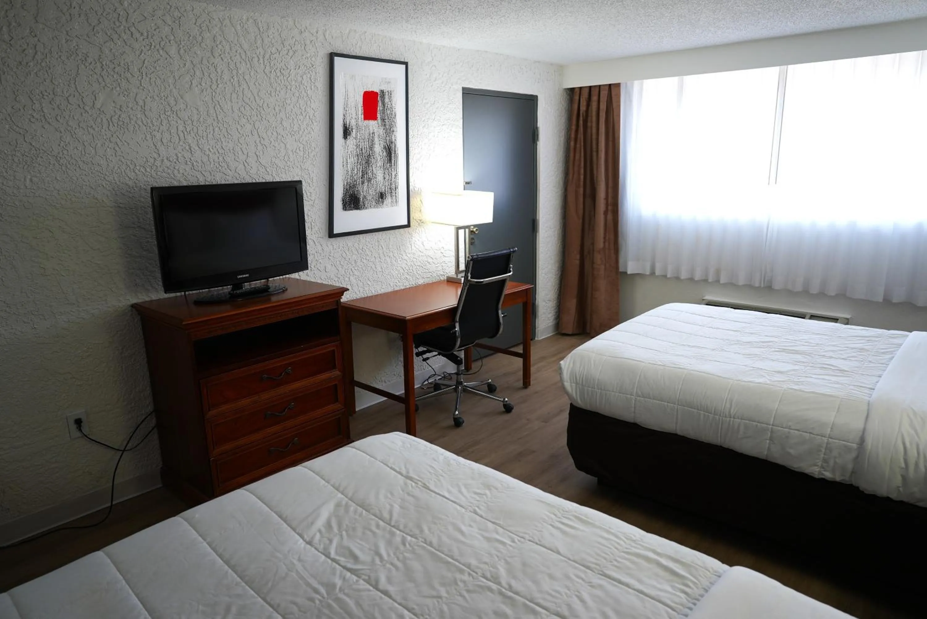 Bedroom in Clarion Hotel Broken Arrow - Tulsa