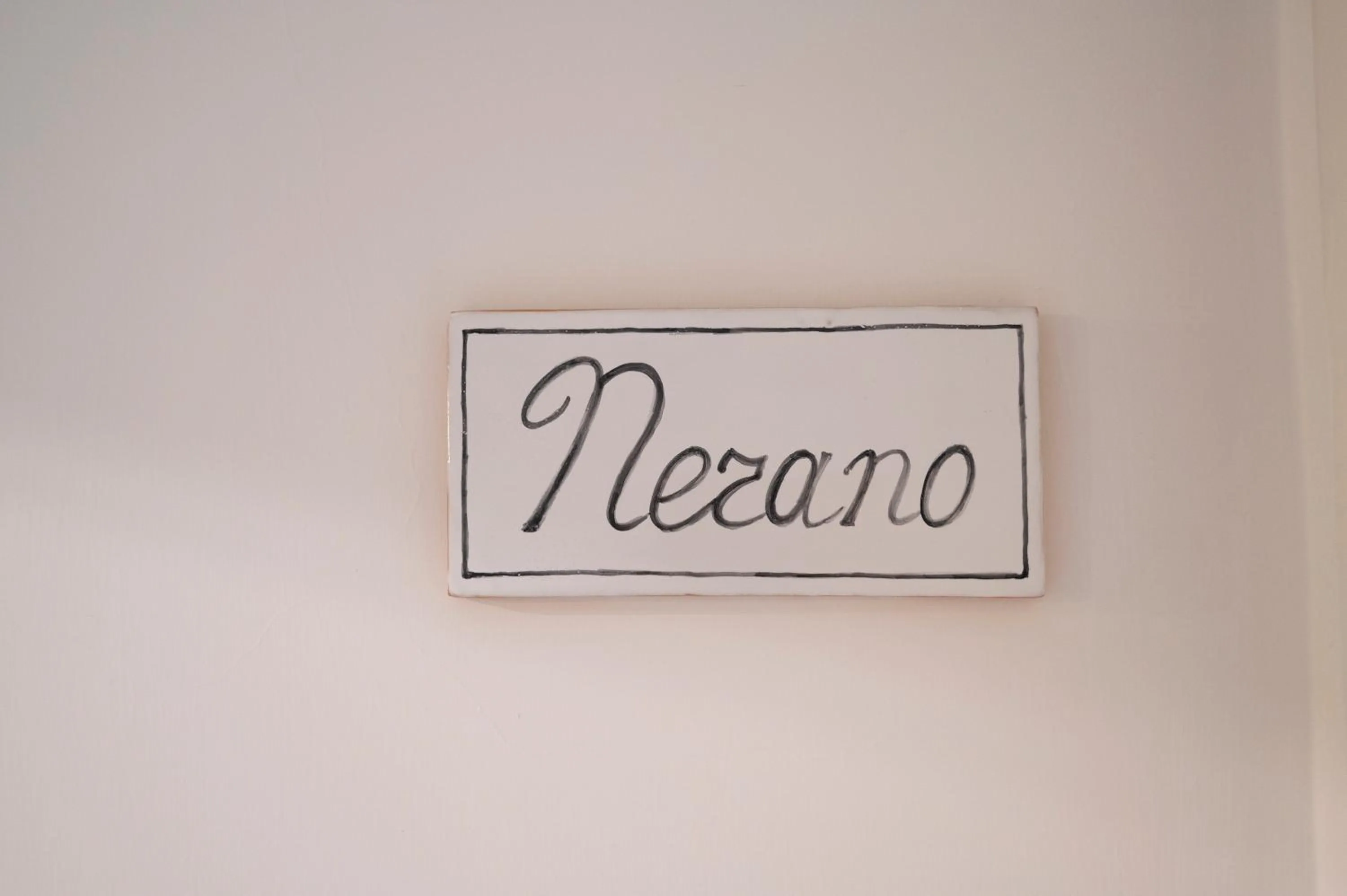 Bedroom in Palazzo della Loggia B&B