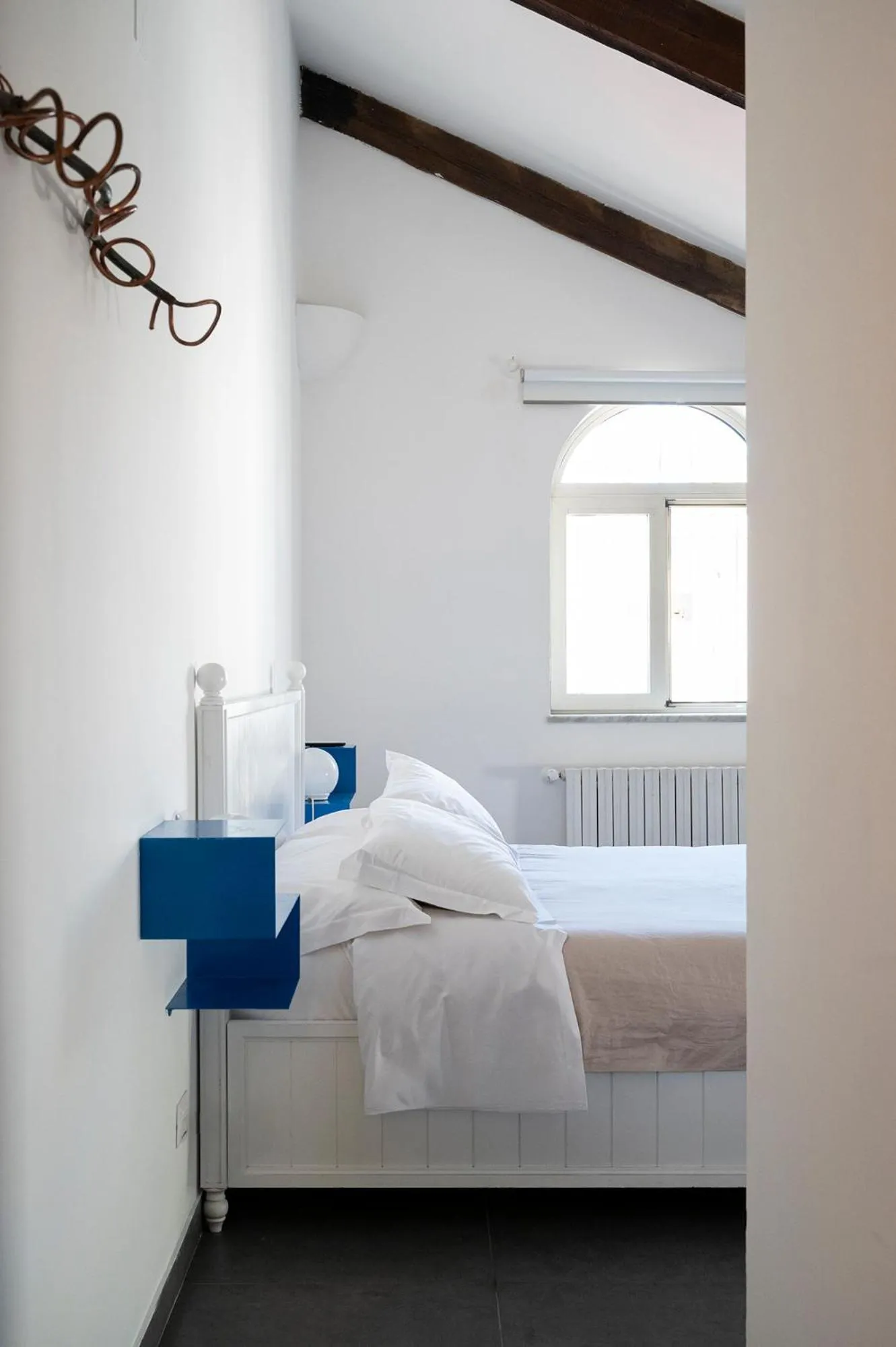 Decorative detail, Bed in Palazzo della Loggia B&B
