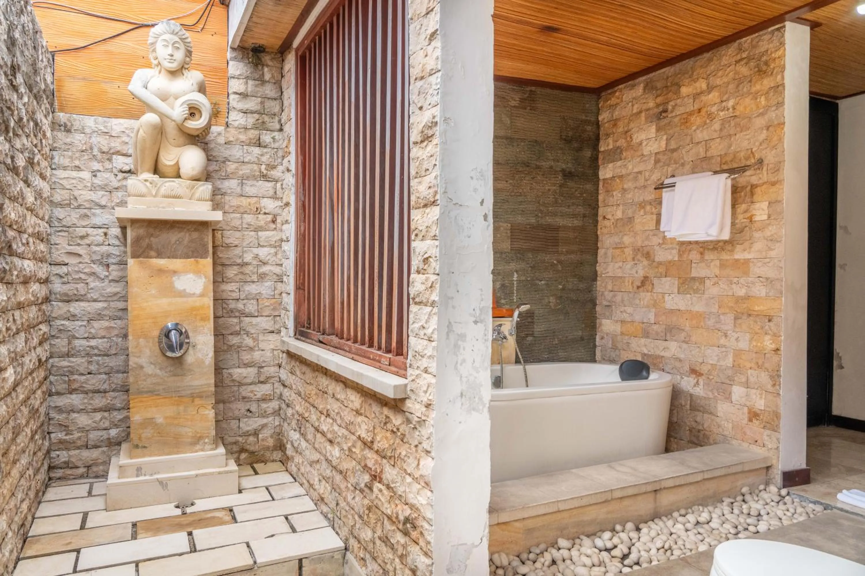 Bathroom in Bali Prime Villas Seminyak by Kanaya Hospitality