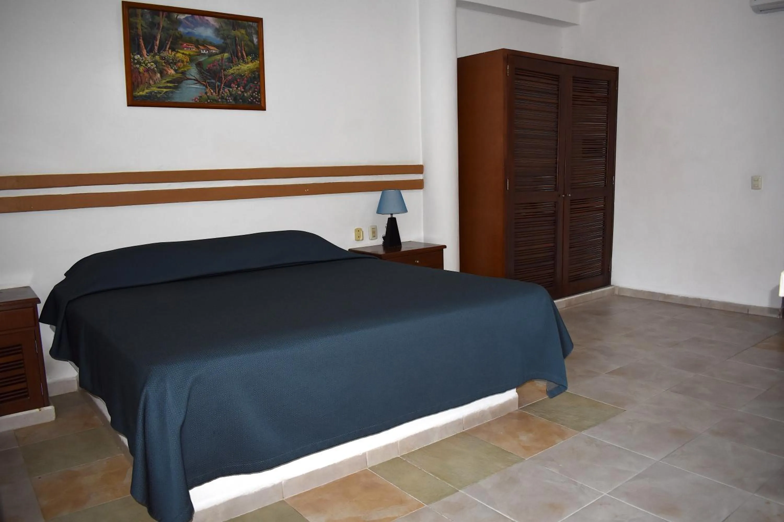 Bed in Plaza Almendros Hotel Isla Mujeres
