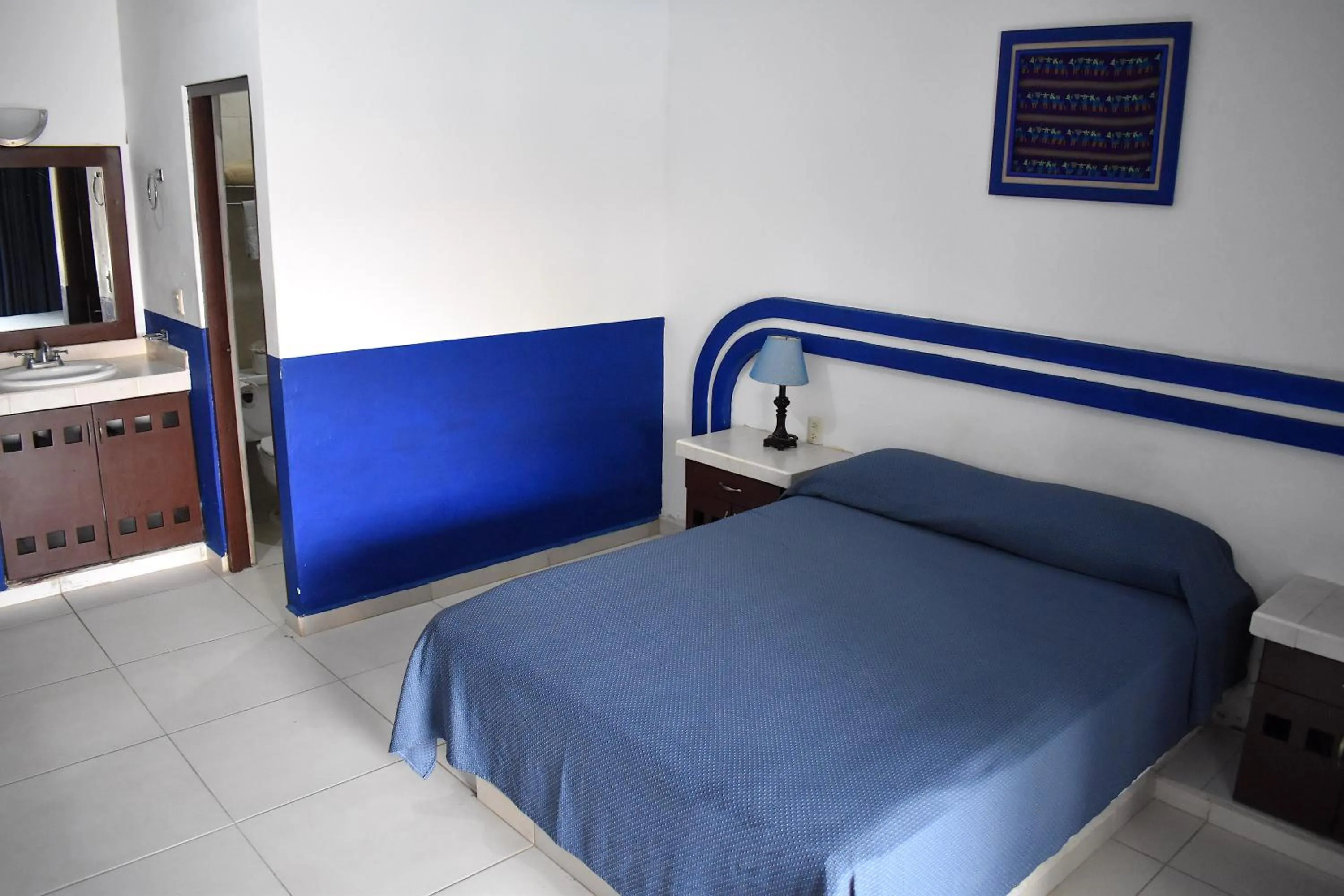 Bed in Plaza Almendros Hotel Isla Mujeres