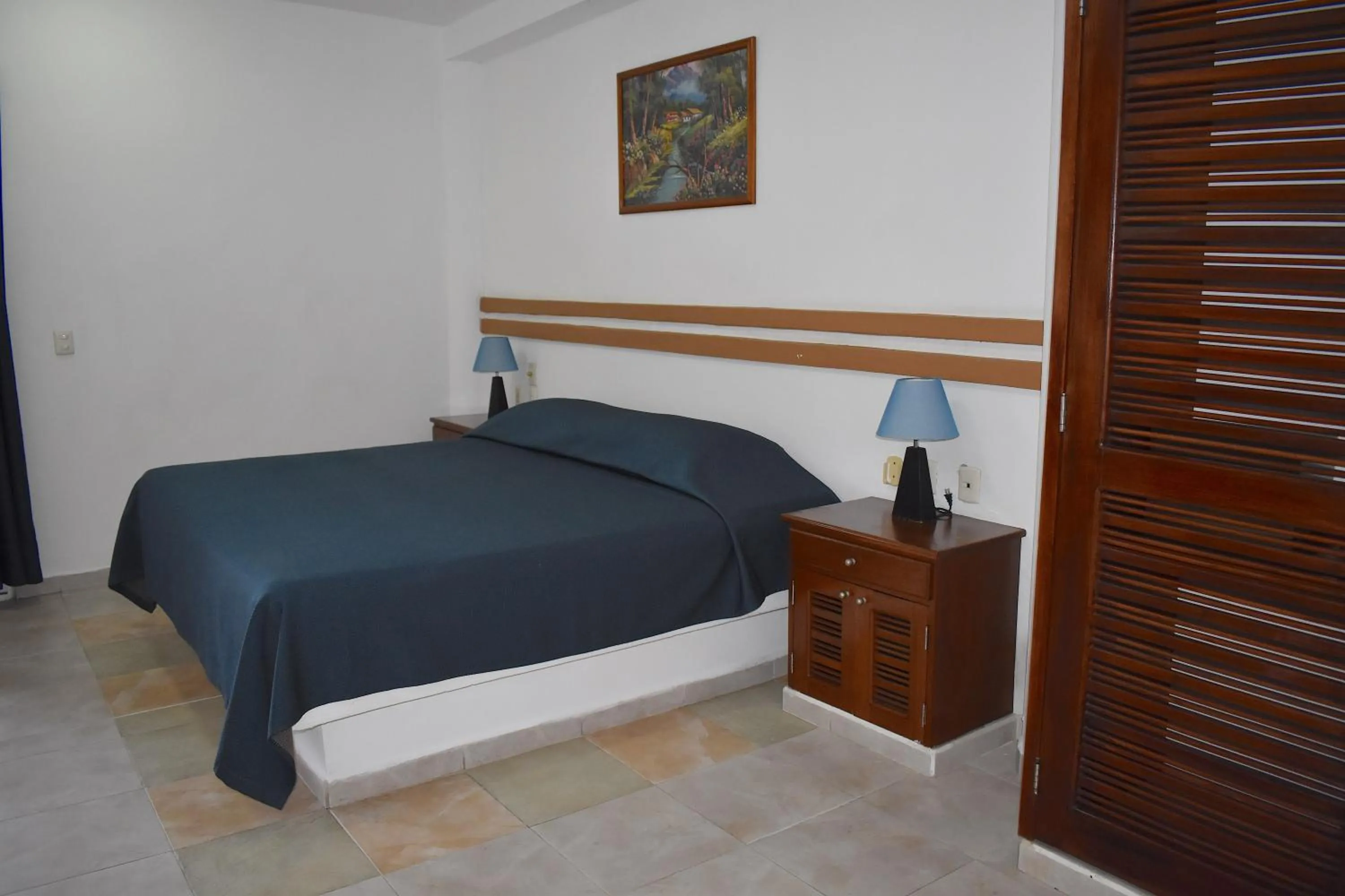 Bed in Plaza Almendros Hotel Isla Mujeres