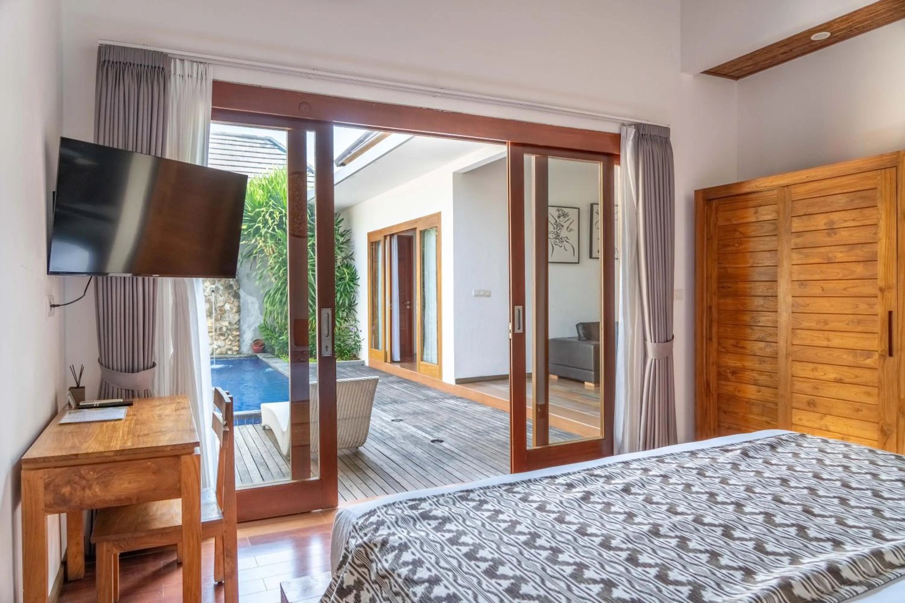 Communal lounge/ TV room in Bali Nyuh Gading Villas