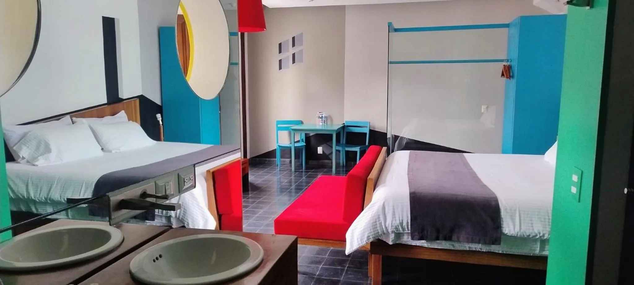 Photo of the whole room, Bed in Del Carmen Concept Hotel Boutique by Chai