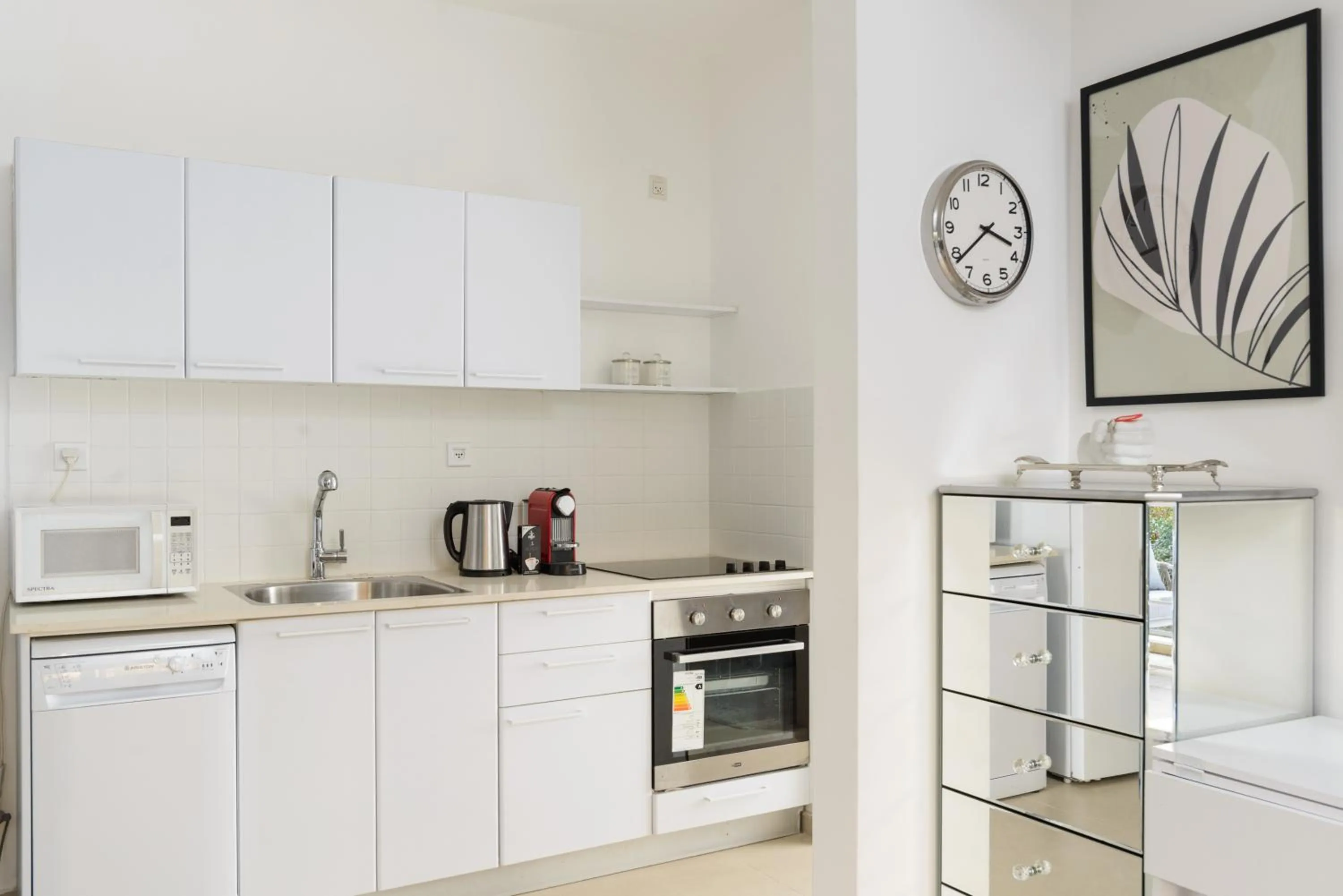 kitchen in Quiet Hideaway & Terrace near Beach by FeelHome