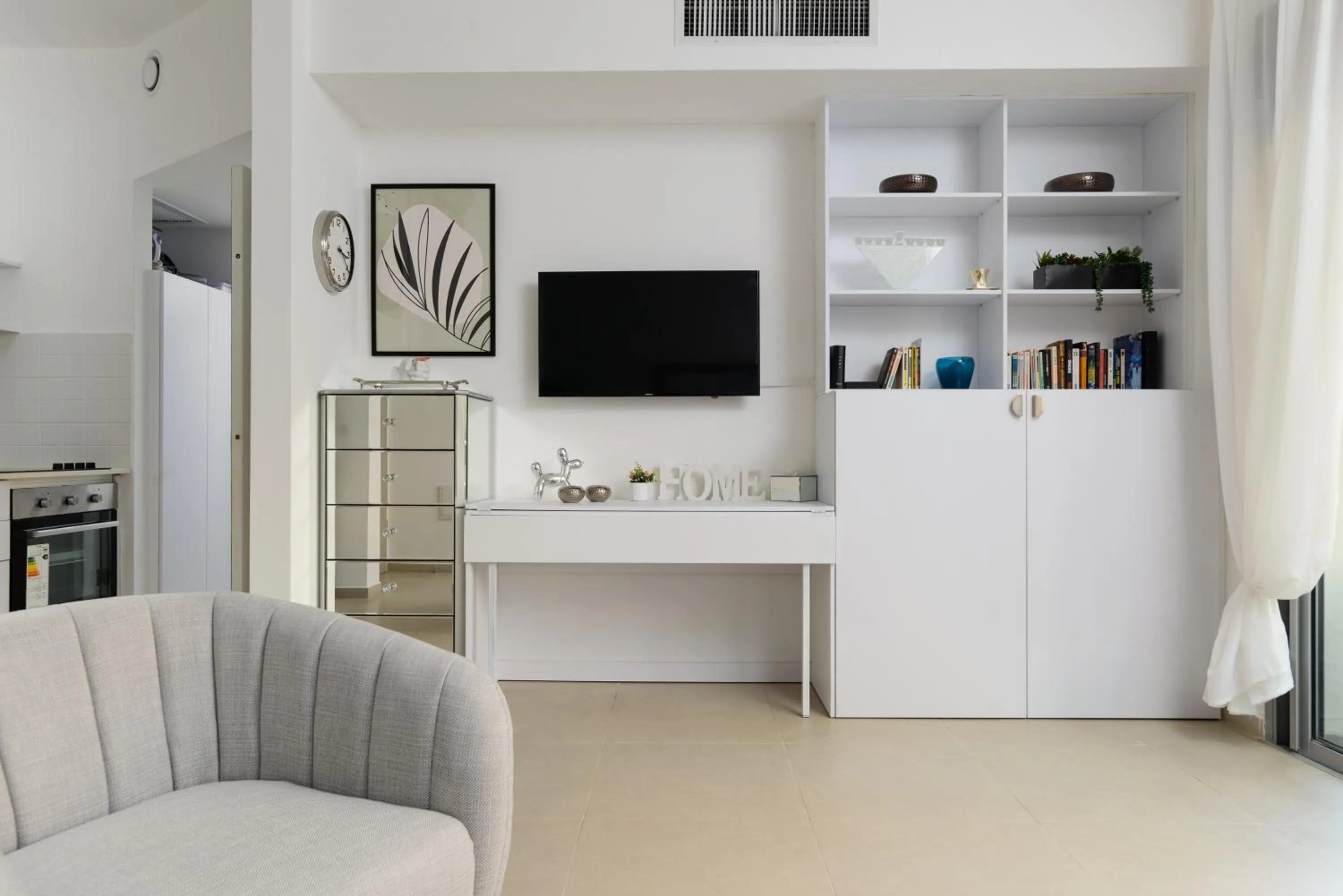 Living room in Quiet Hideaway & Terrace near Beach by FeelHome