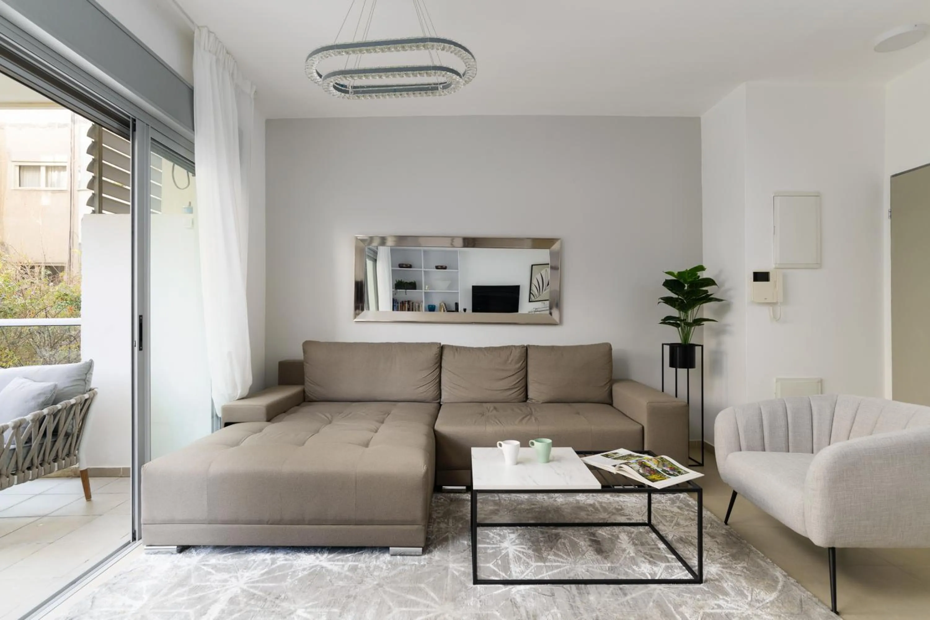 Living room in Quiet Hideaway & Terrace near Beach by FeelHome