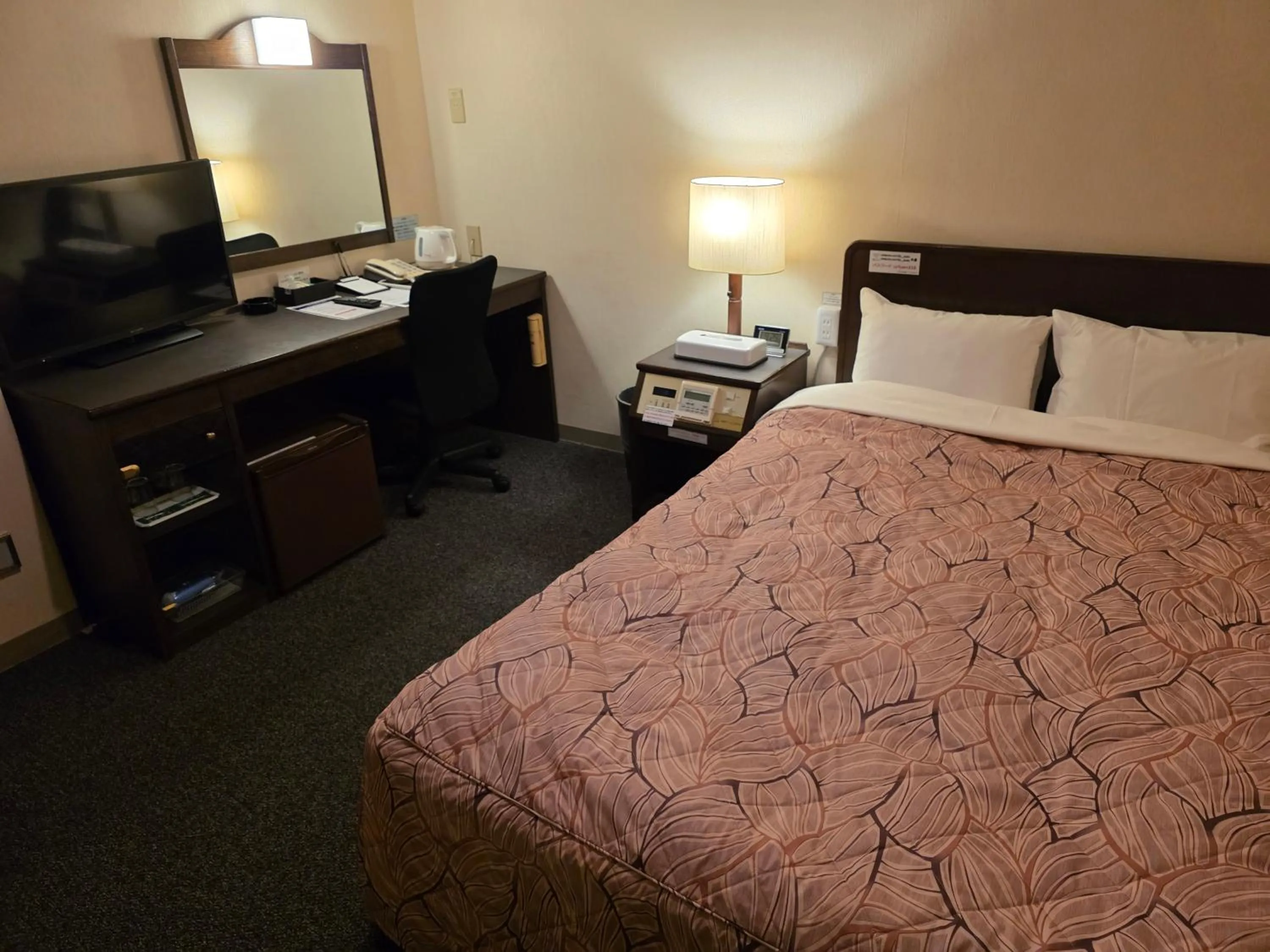 Bed in Nobeoka Urban Hotel