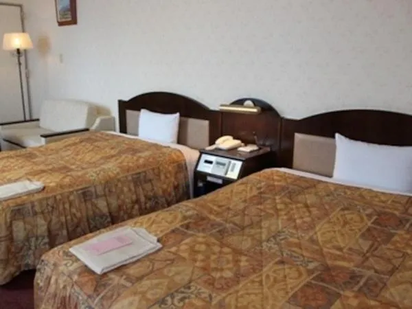 Bed in Nobeoka Urban Hotel