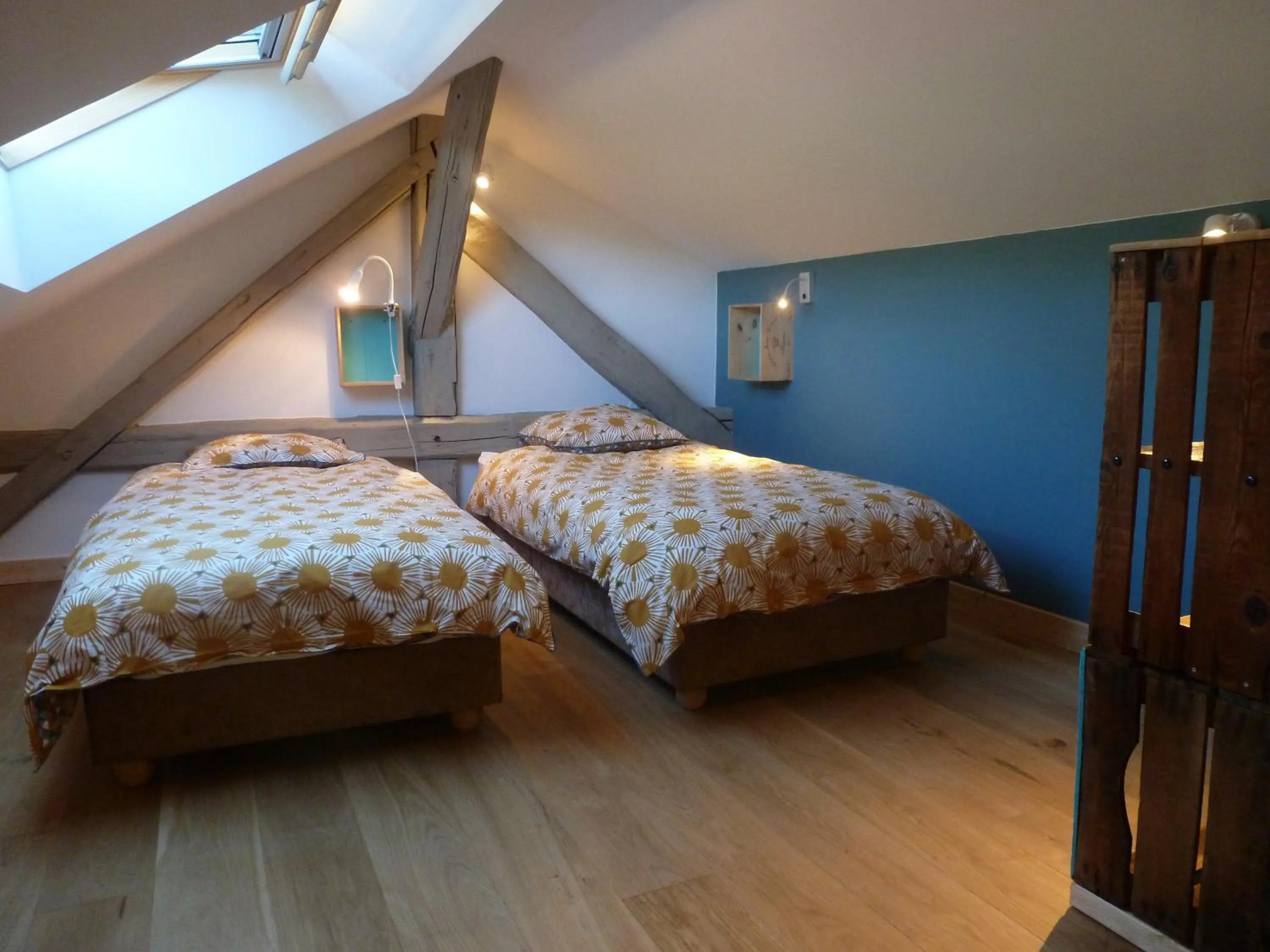 Bed in Au Cheval Blanc - appartements et chambres d'hôtes