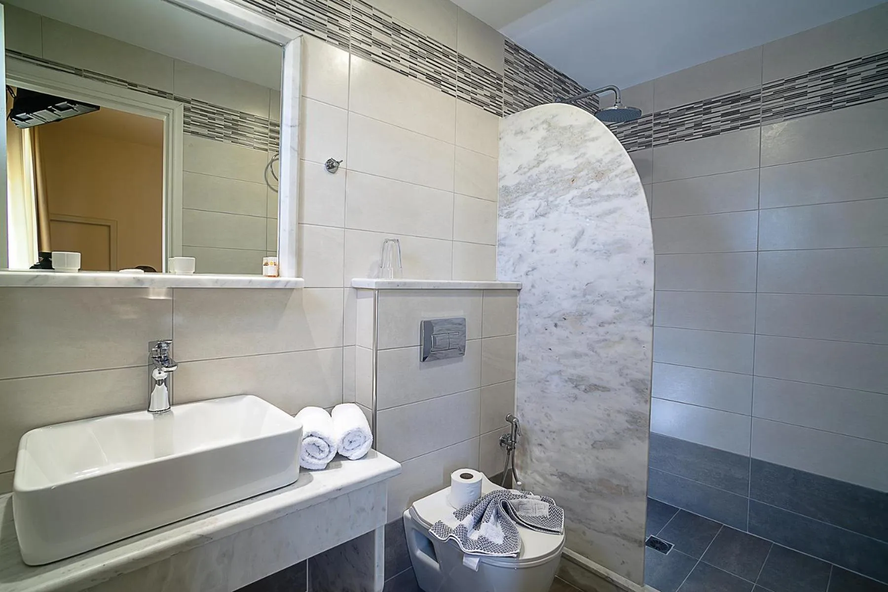 Bathroom in Amaryllis Hotel