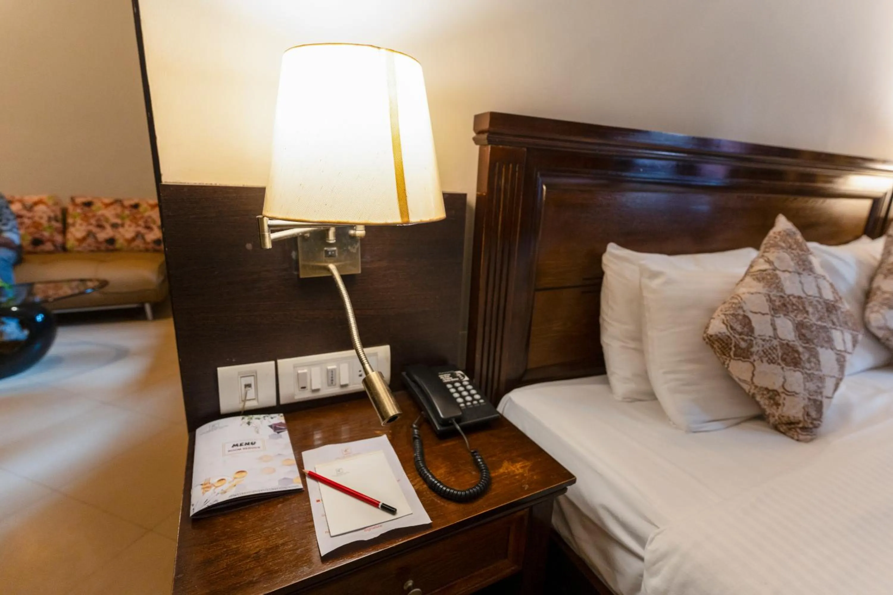 Bed in Neelam's The Grand Hotel Goa