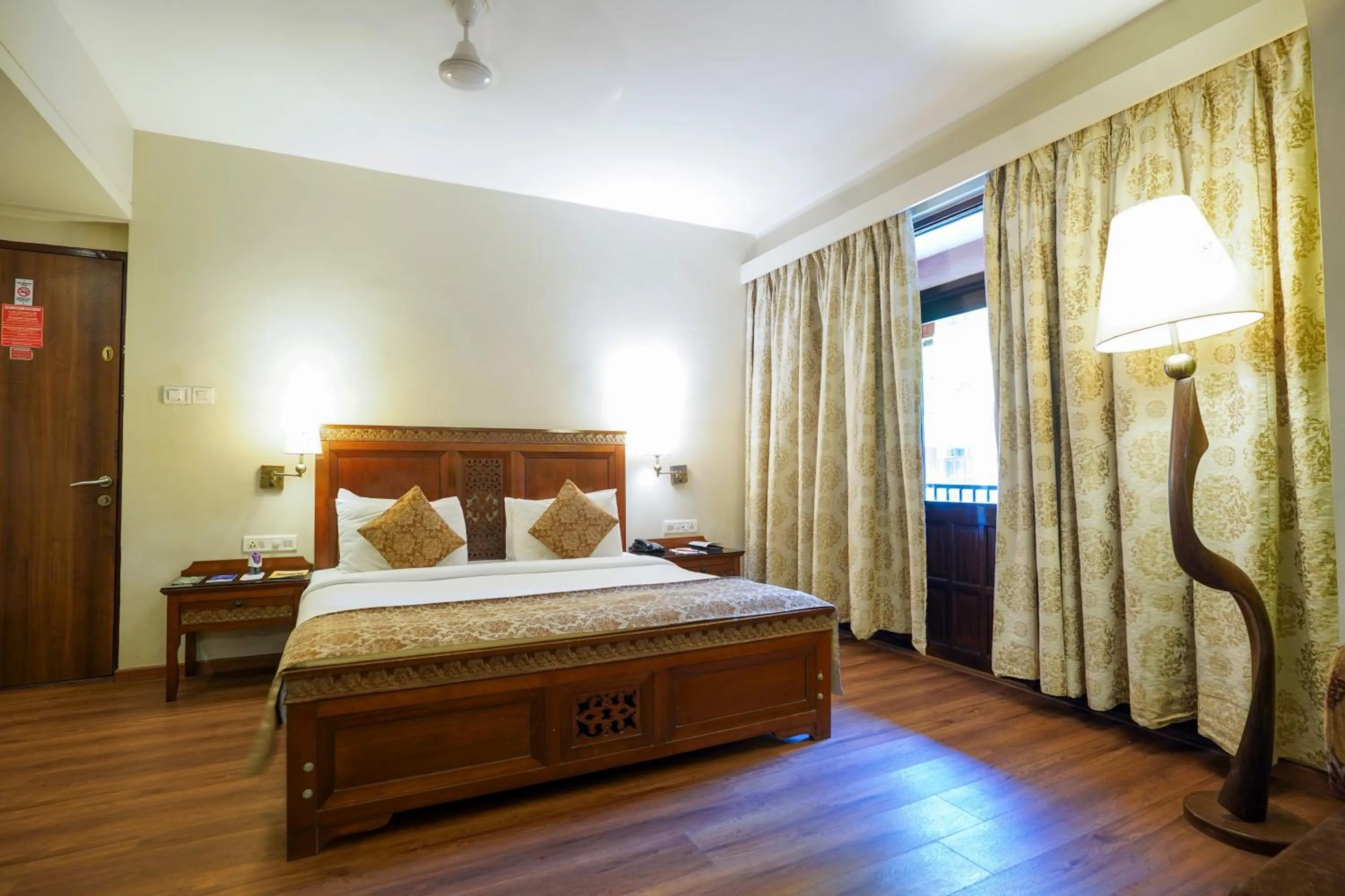 Bed in Neelam's The Grand Hotel Goa