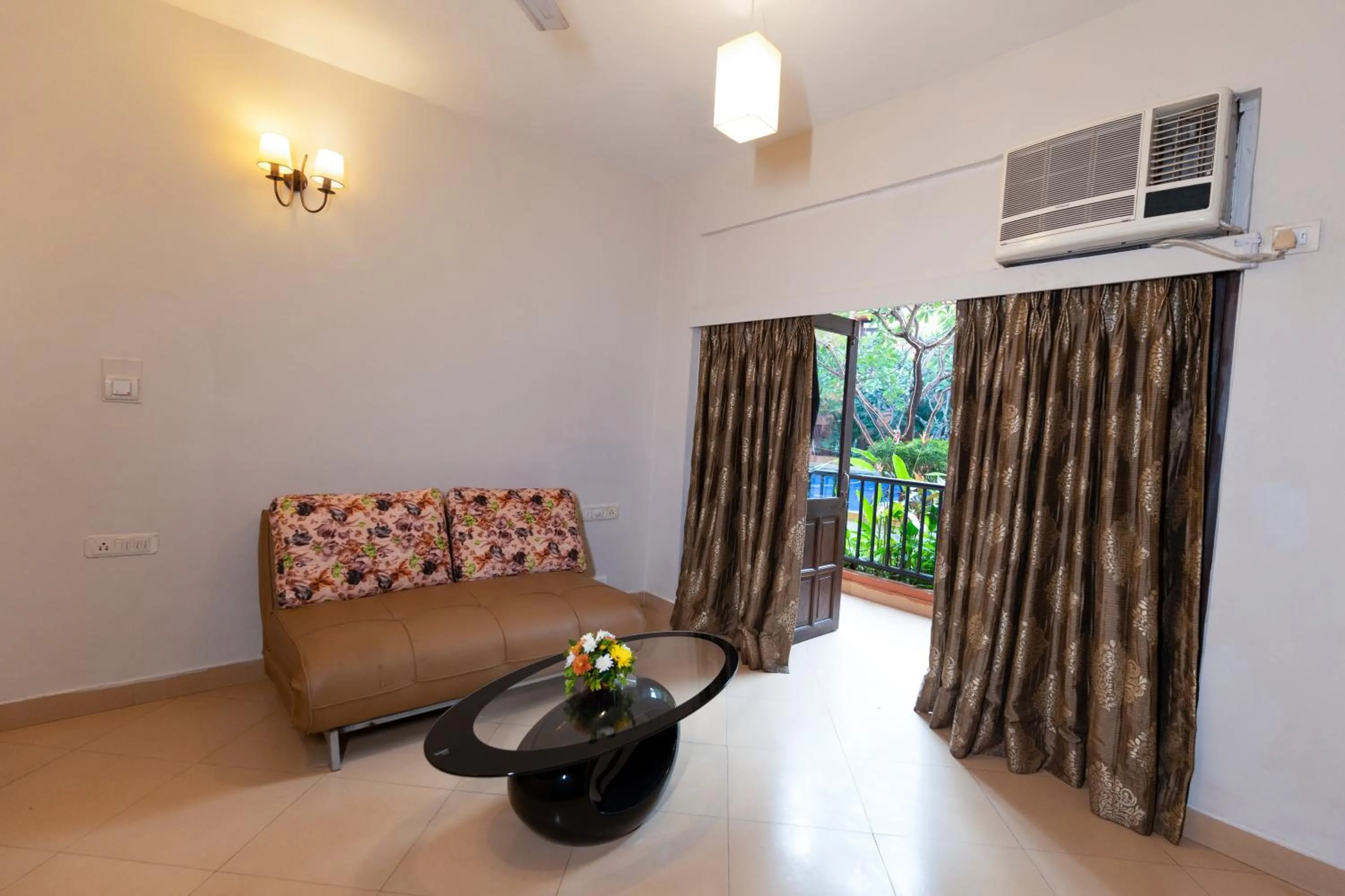 Seating area in Neelam's The Grand Hotel Goa