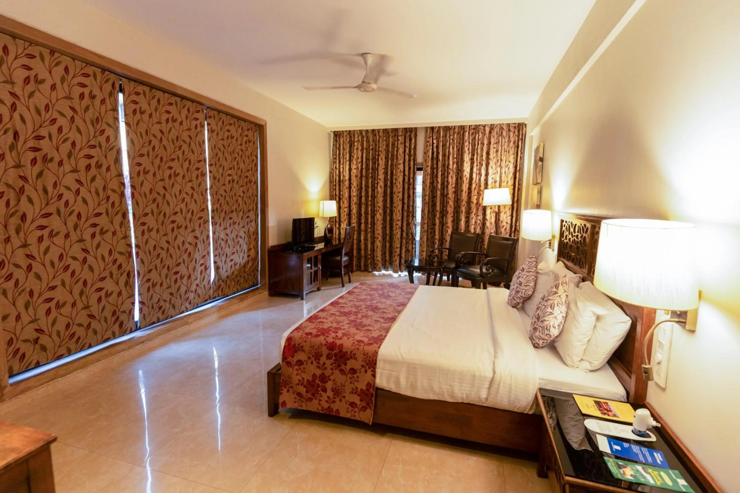 Bed in Neelam's The Grand Hotel Goa